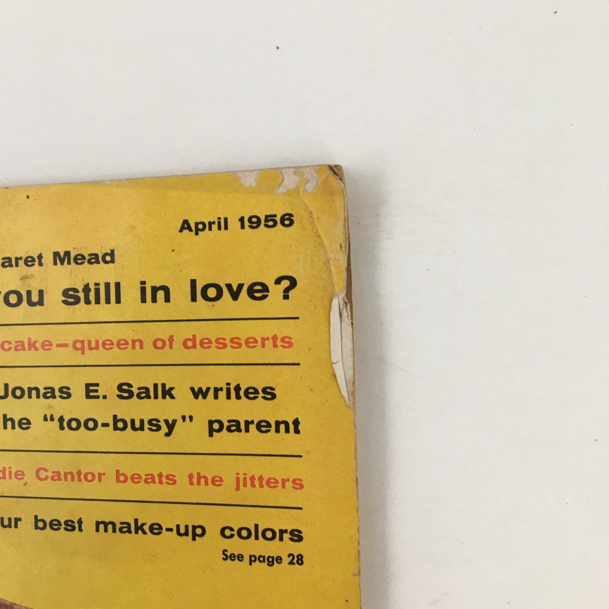 Cover of Family Circle Magazine April 1956 featuring Eddie Cantor's article, colorful yellow design with headlines about love and parenting.