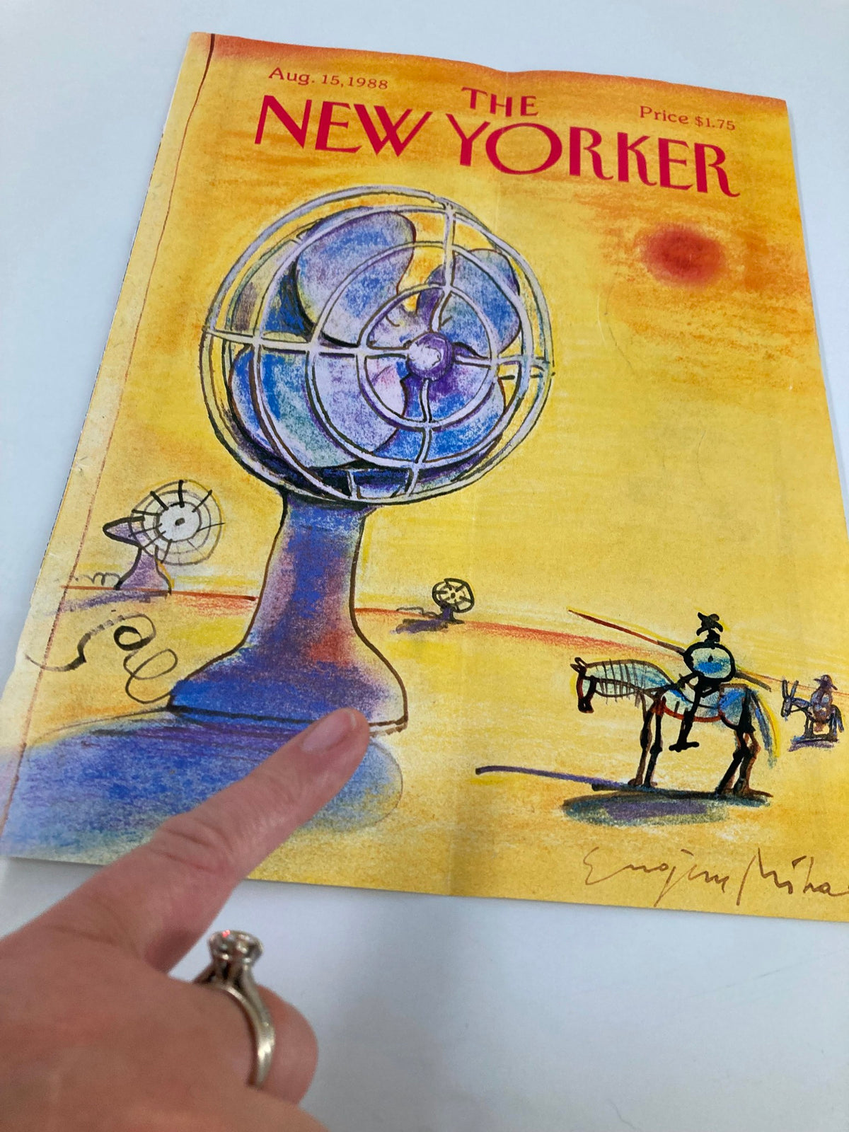 The New Yorker cover from August 15, 1988, featuring a giant fan and whimsical illustrations by Eugene Mihaesco, highlighting the artistic flair of the late 1980s.