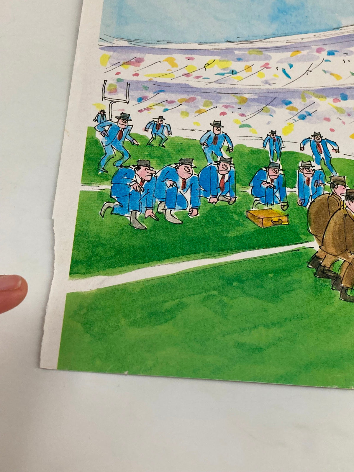Close-up view of The New Yorker November 16 1987 Game Plan Cover by James Stevenson, highlighting the unique art style and vintage charm of the magazine's football-themed illustration on a sports field.