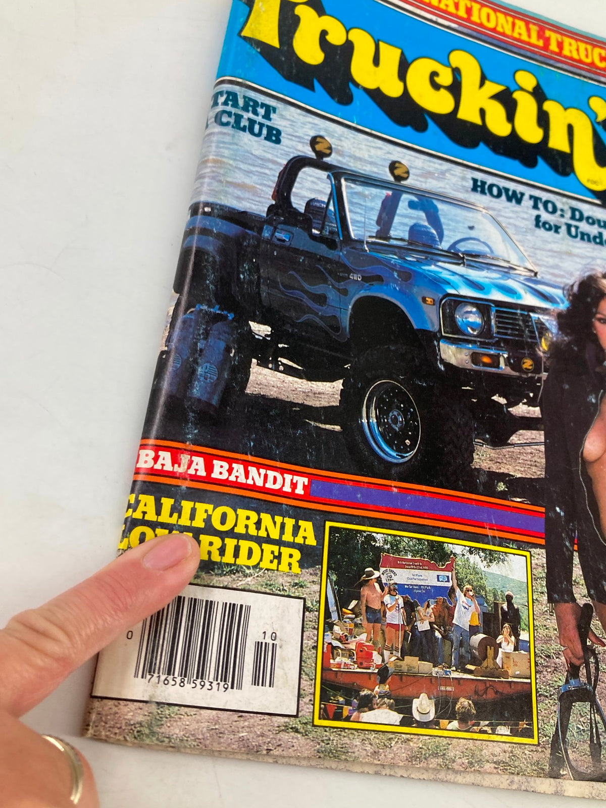 Close-up of the cover of VTG Truckin Magazine October 1980 showcasing Debora Zullo as Driver of the Year and notable articles about trucking culture.