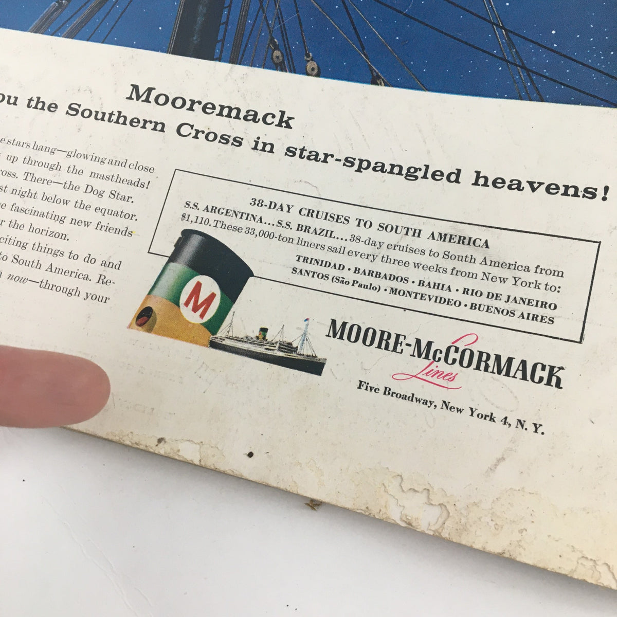 Advertisement page from the Holiday Magazine November 1956, featuring information about Moore-McCormack Cruises, an exciting promotion of travel to South America.
