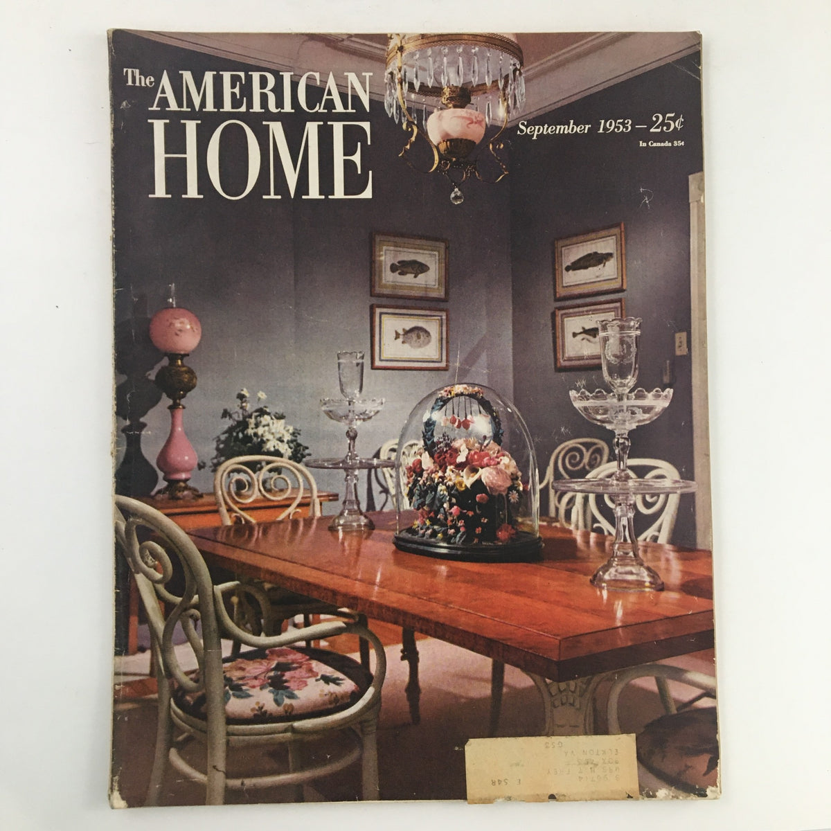 Cover of The American Home Magazine September 1953 featuring a dining room scene with decorative elements, highlighting the article 'Our Radiant Heated Dog House'.