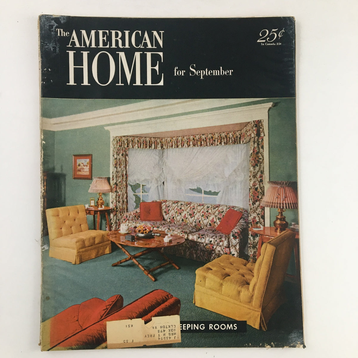 Cover of The American Home Magazine September 1952 featuring vintage interior decor with floral curtains and classic furniture.