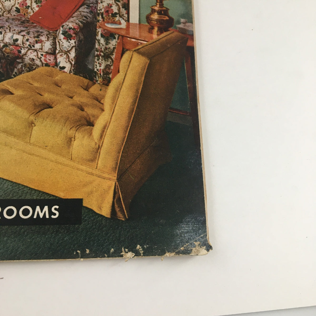 Cover image of The American Home Magazine, September 1952 edition, featuring vintage decor with a yellow upholstered chair and floral patterned couch.