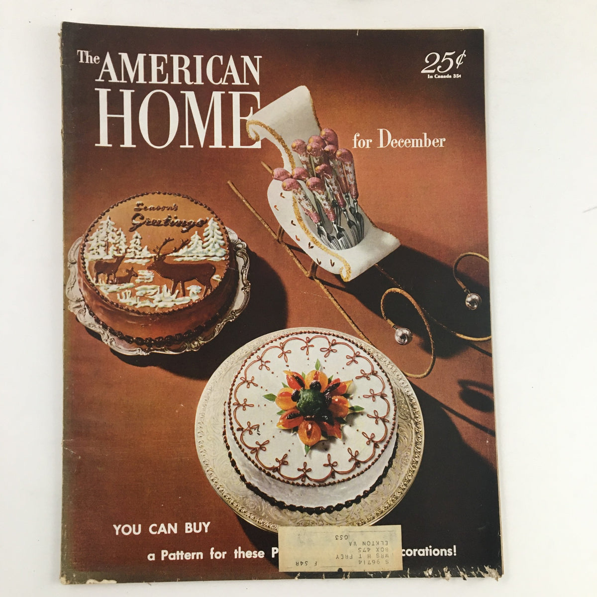 Cover image of The American Home Magazine December 1953 featuring festive holiday cakes and a decorative vase. Title reads 'The American Home for December'.