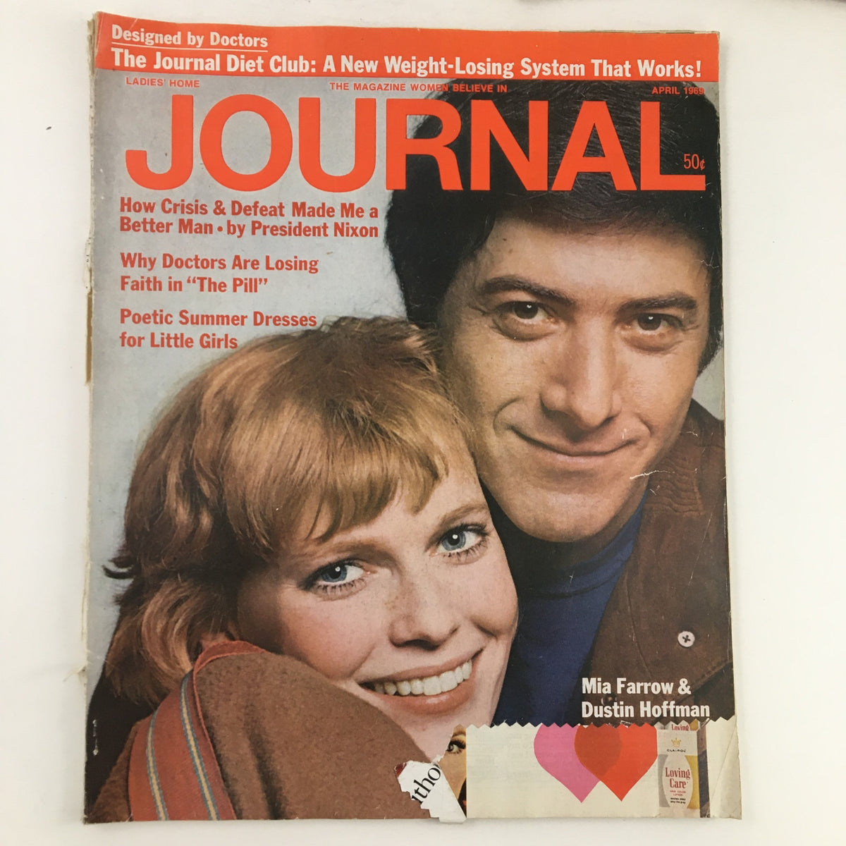 Cover of the Ladies' Home Journal Magazine from April 1969 featuring actors Mia Farrow and Dustin Hoffman. This vintage magazine showcases 1960s pop culture with vibrant colors and topics relevant to the era.