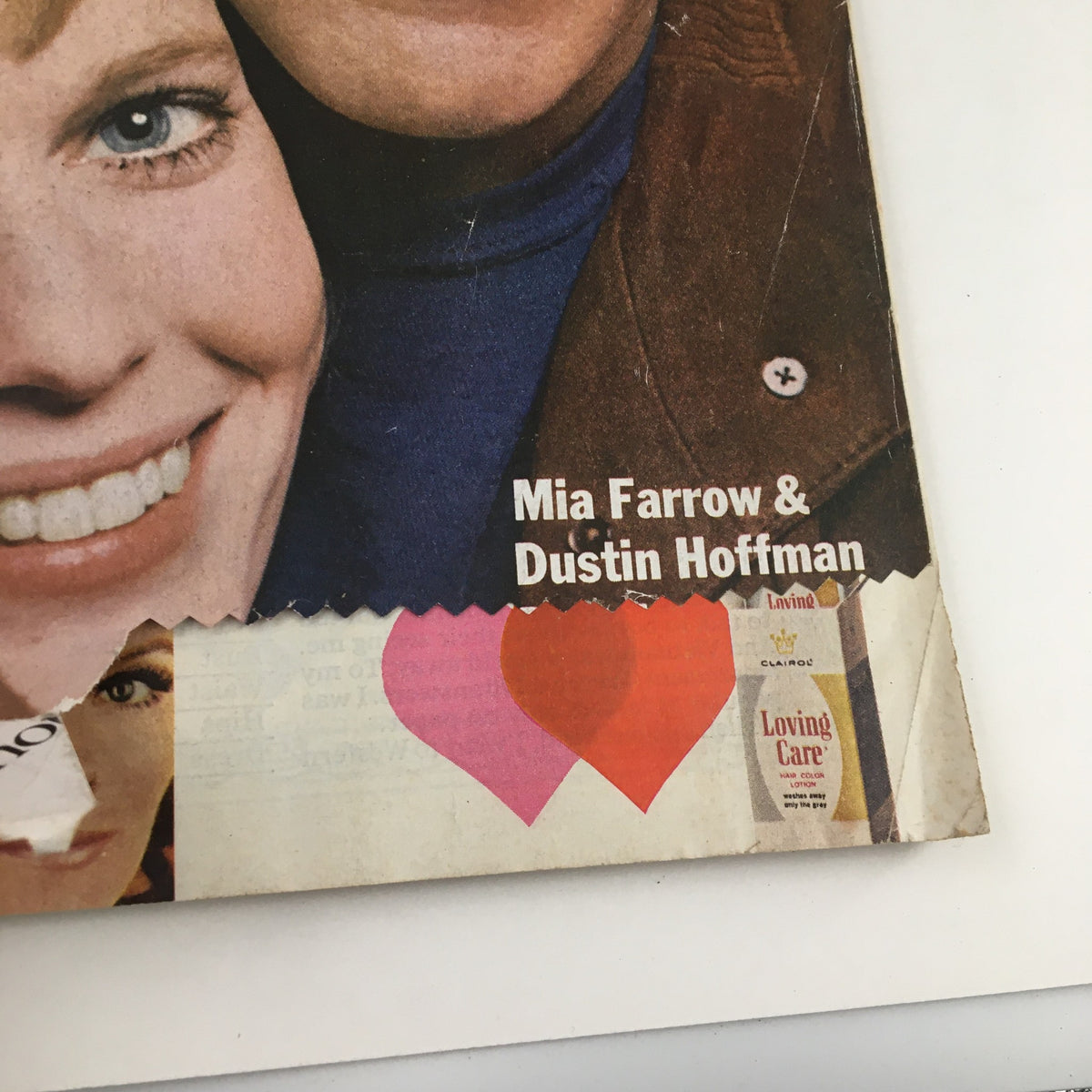 Close-up of the cover of Ladies' Home Journal Magazine April 1969 featuring iconic actors Mia Farrow and Dustin Hoffman. The cover includes a colorful design with hearts.