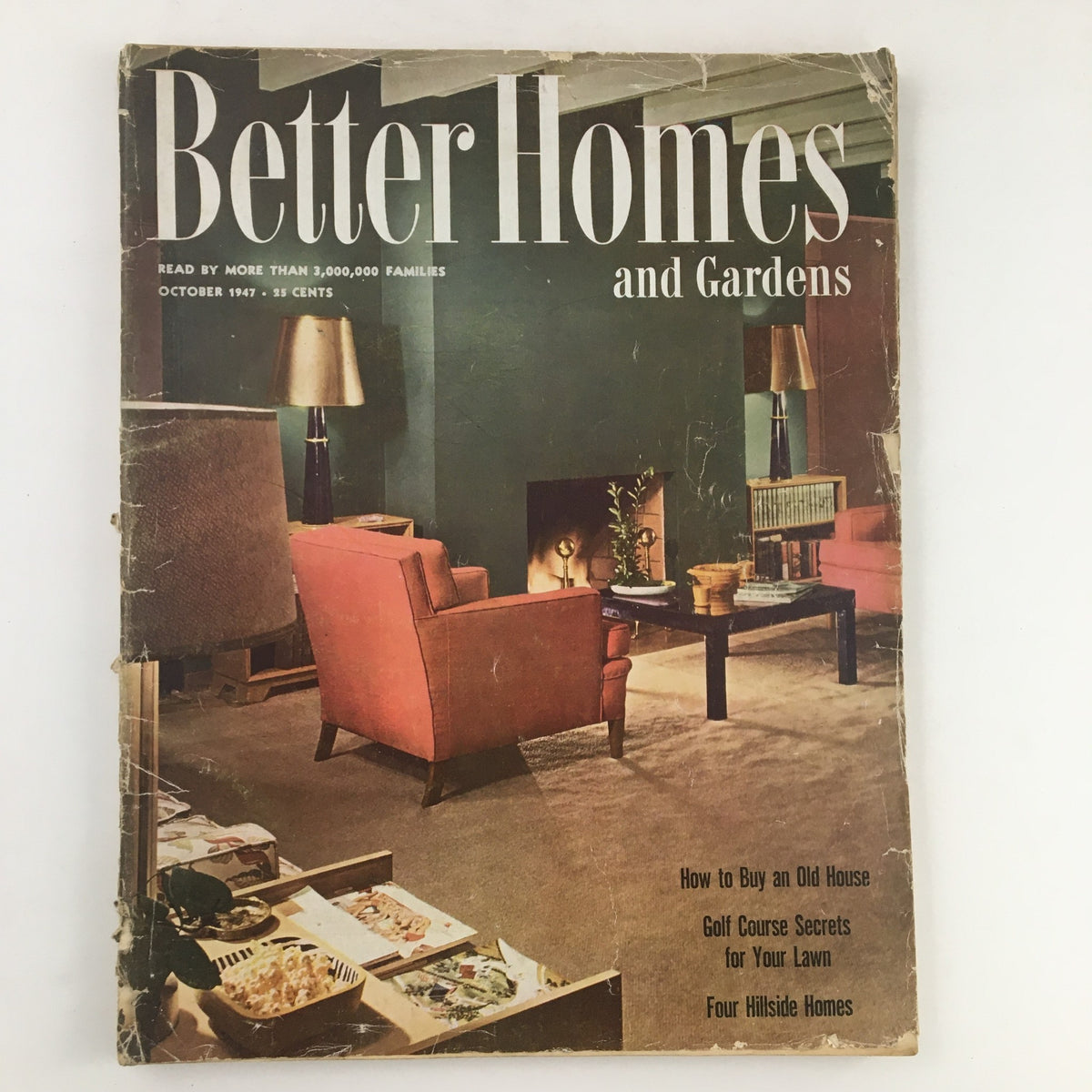 Cover of Better Homes & Gardens October 1947 magazine featuring a living room with a fireplace, showcasing tips for achieving golf course quality lawns.