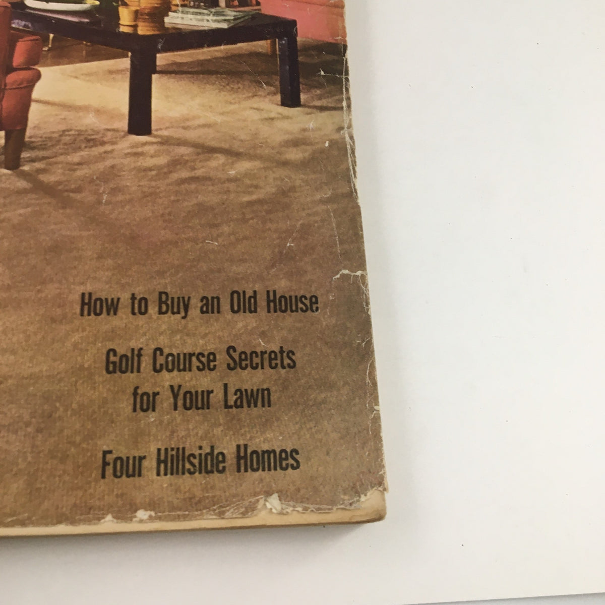 Close-up of the title section from Better Homes & Gardens October 1947 magazine, highlighting articles on old house buying and golf course lawn secrets.