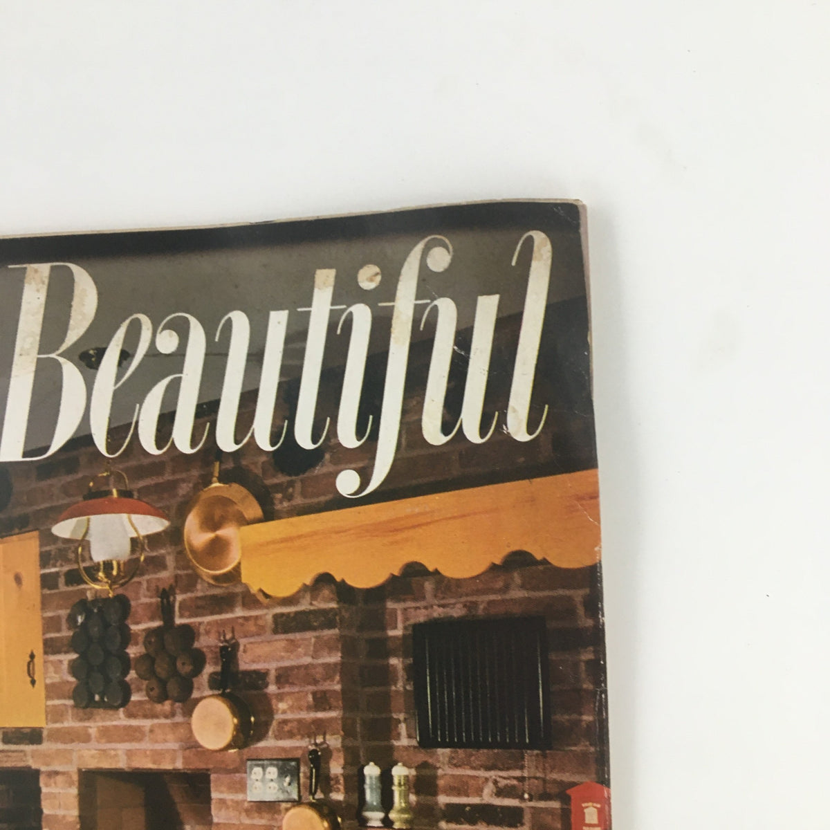 Top section of House Beautiful Magazine, January 1952 displaying the title 'House Beautiful' and elements of kitchen decor, emphasizing 1950s design trends.