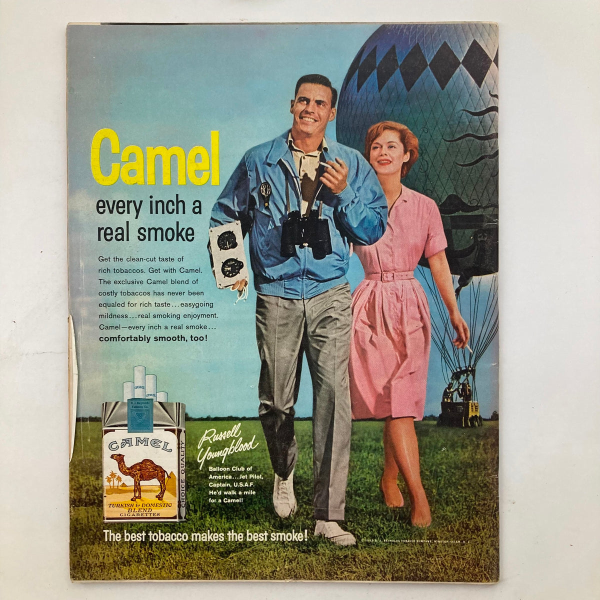 Advertisement page from VTG Life Magazine November 1, 1963 promoting Camel cigarettes with a couple enjoying their time outdoors.