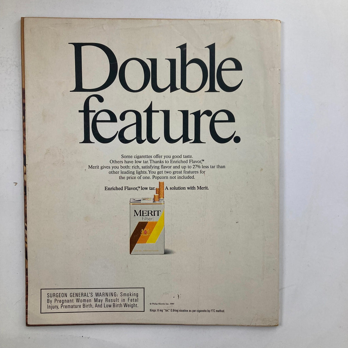 Vintage advertisement featuring the 'Double feature' slogan for Merit cigarettes, highlighting their enriched flavor and low tar. From the VTG Life Magazine Spring 1989 Vol 12 No. 5 featuring Funnyman Robin Williams.