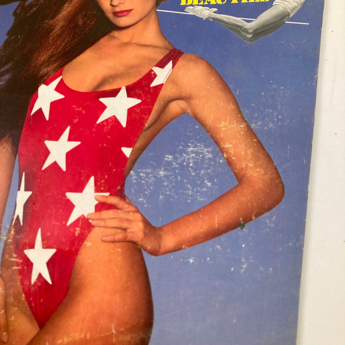Close-up of VTG Life Magazine February 1986 cover featuring Paulina Porizkova in a red swimsuit with white stars, highlighting the magazine's retro appeal.