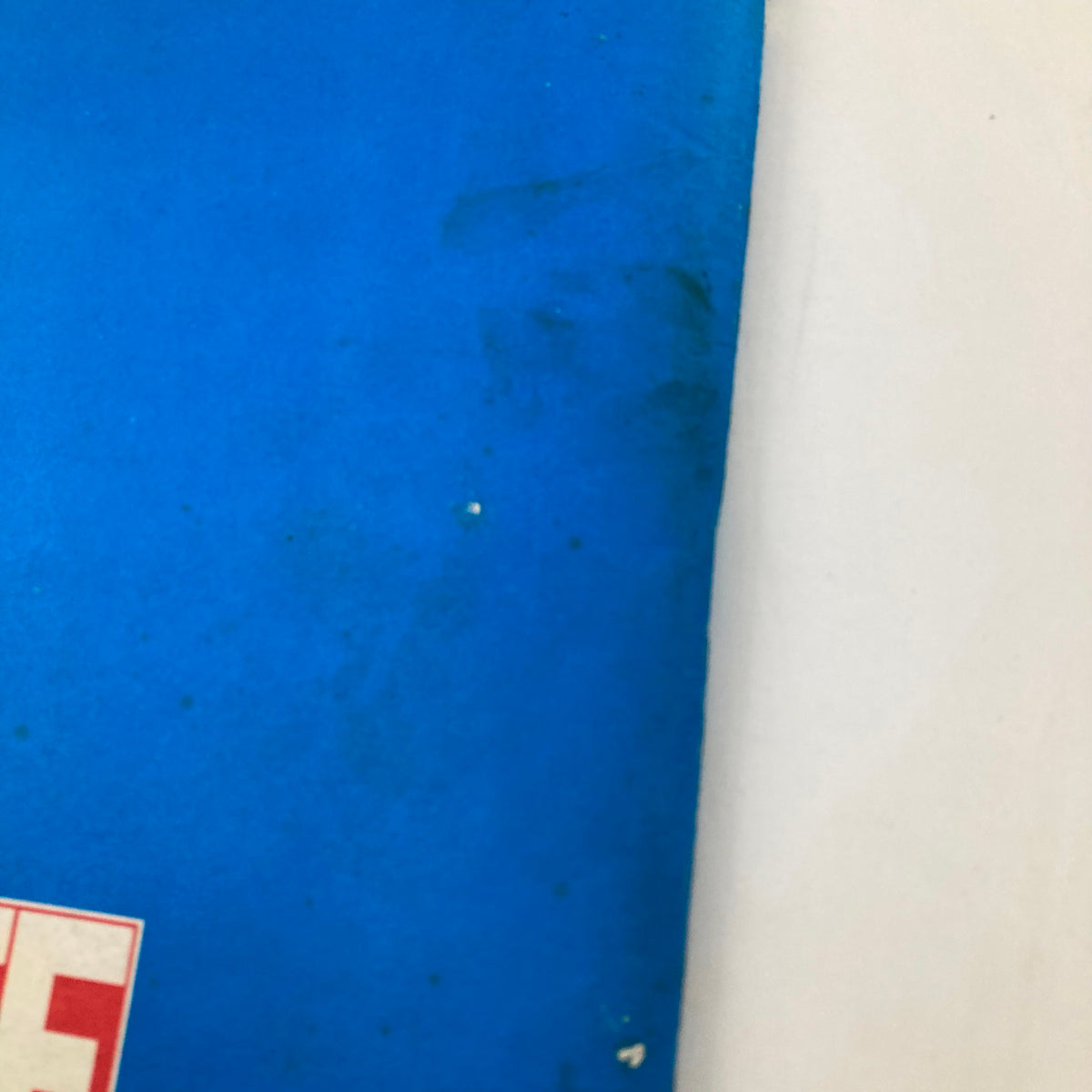Close-up of the back cover of the VTG Life Magazine May 1988, highlighting the blue background and LIFE logo with visible wear and tear, indicative of its vintage status.