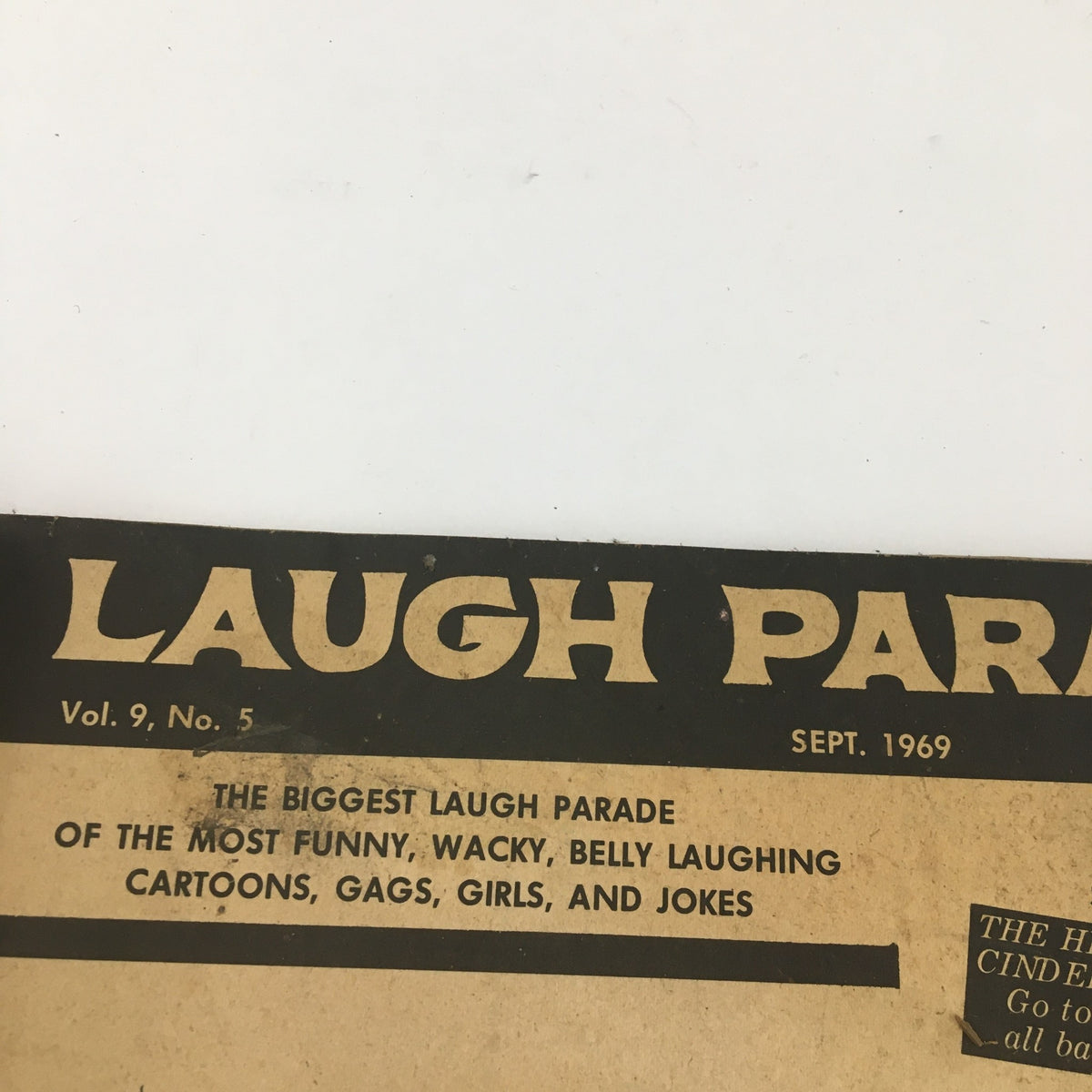Close-up image of the Laugh Parade Magazine September 1969 title page, showcasing details about the magazine's theme and humorous content.