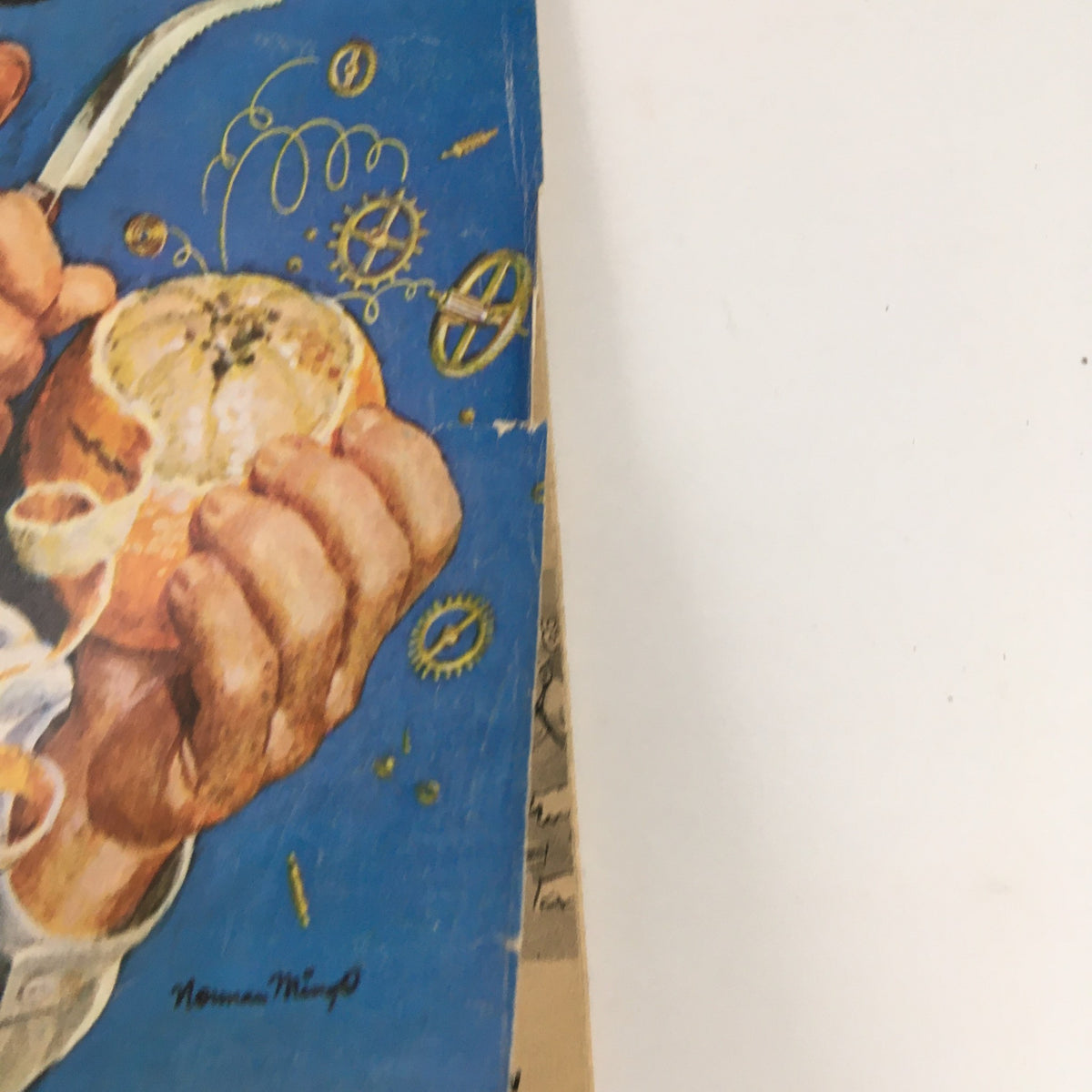 Close-up of Mad Magazine June 1973 No. 159 cover, featuring a hand holding a lemon with whimsical blue background and gears, showcasing its unique art.