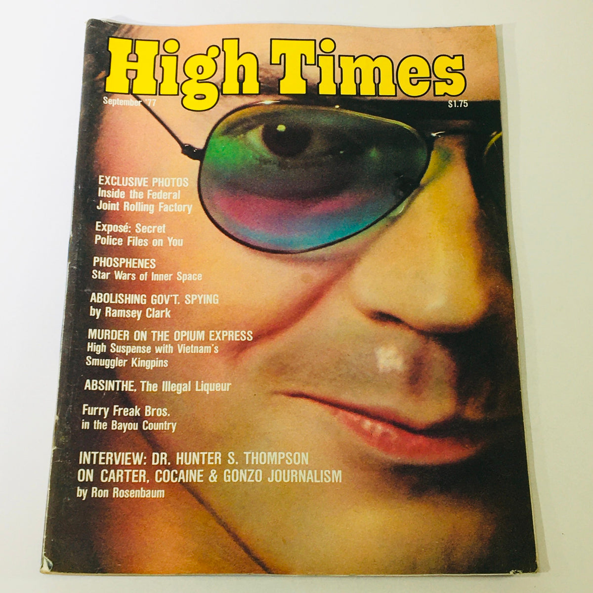 Cover of VTG High Times Magazine September 1977 featuring an interview with Dr. Hunter S. Thompson on Carter, showcasing vibrant sunglasses and headlines about political and cultural topics of the era.