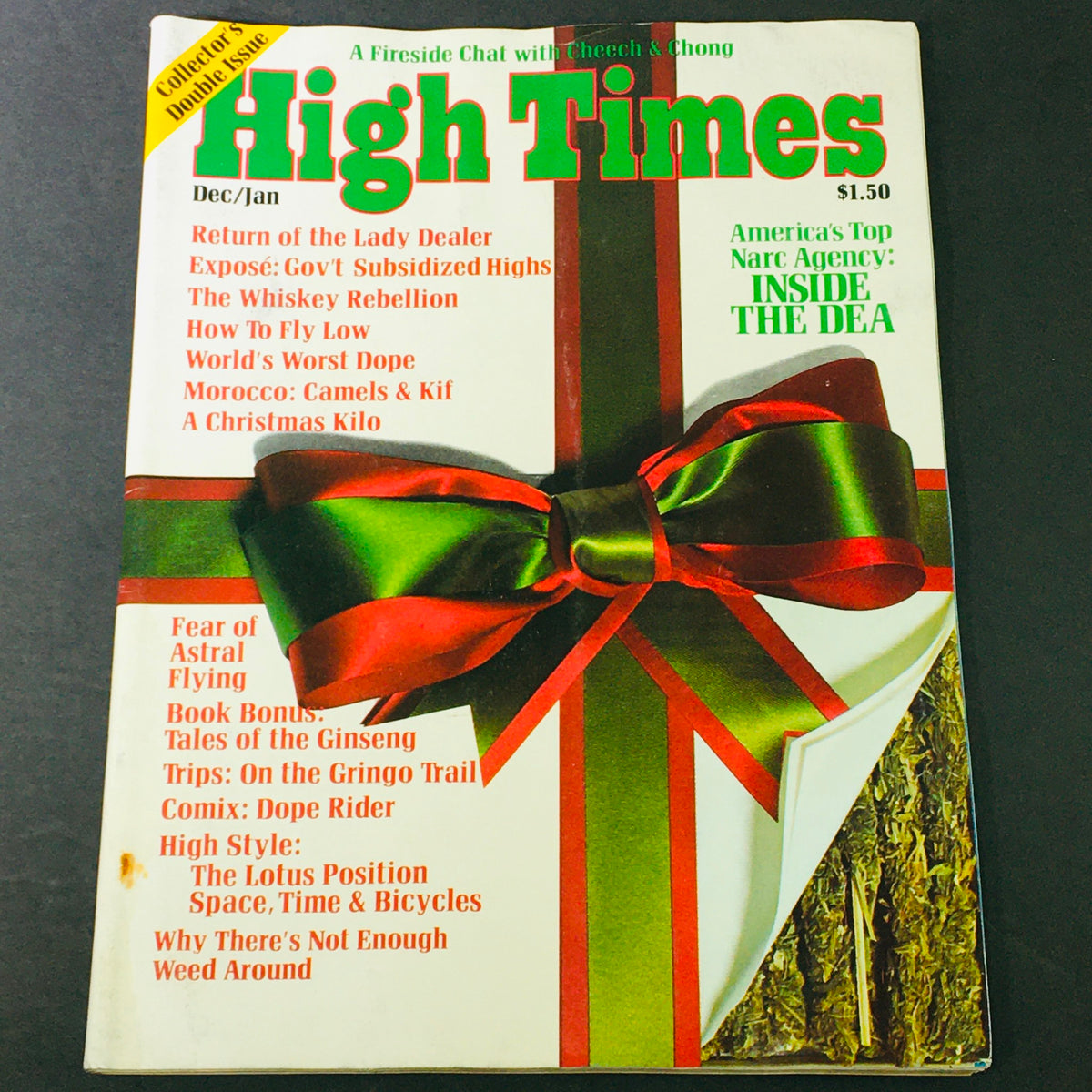 VTG High Times Magazine December January 1975 #7 featuring articles about the DEA, drug enforcement, and cannabis culture, with a festive cover art design.