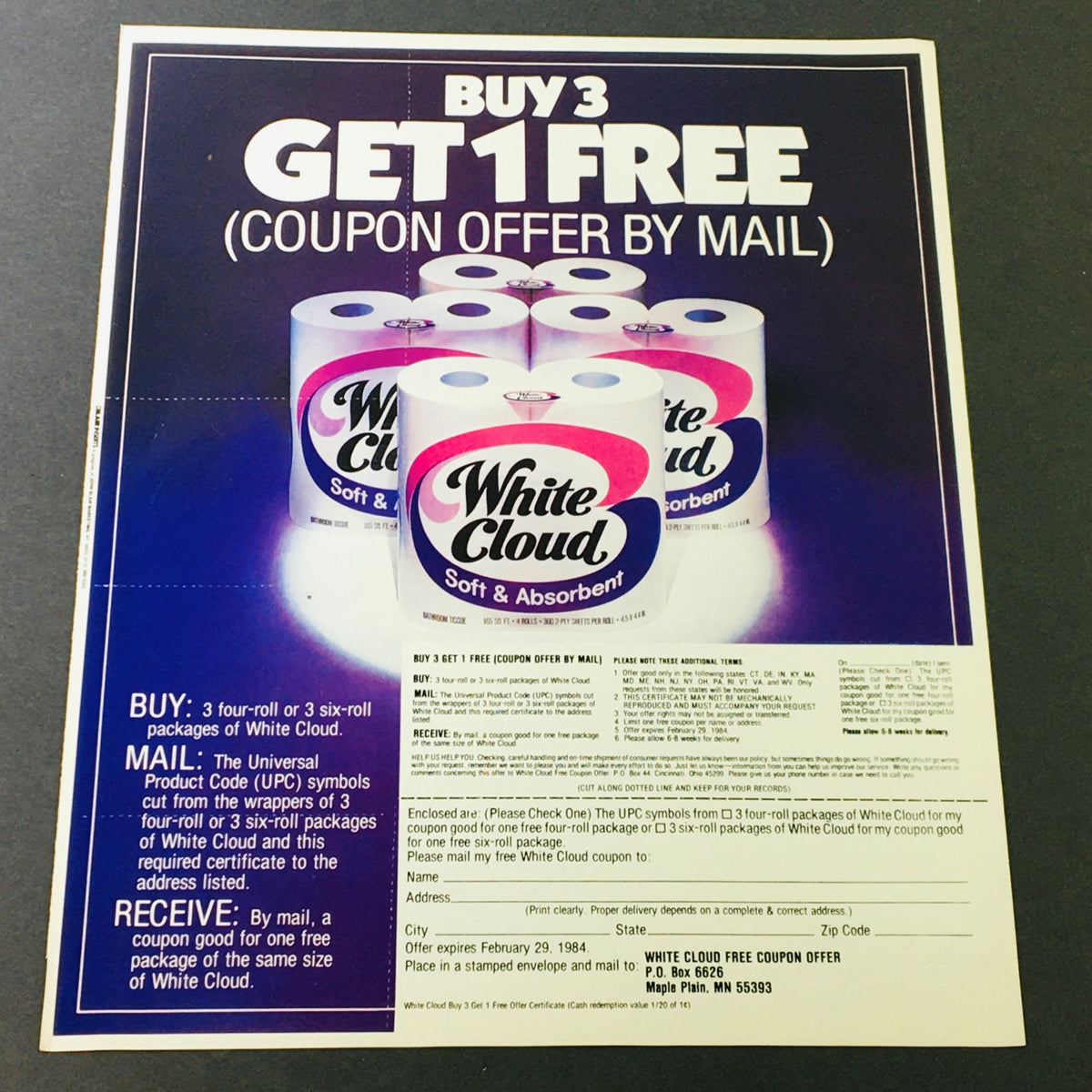 VTG Retro 1984 White Cloud Tissue coupon advertisement showing 'Buy 3 Get 1 Free' offer, featuring promotional packaging design.