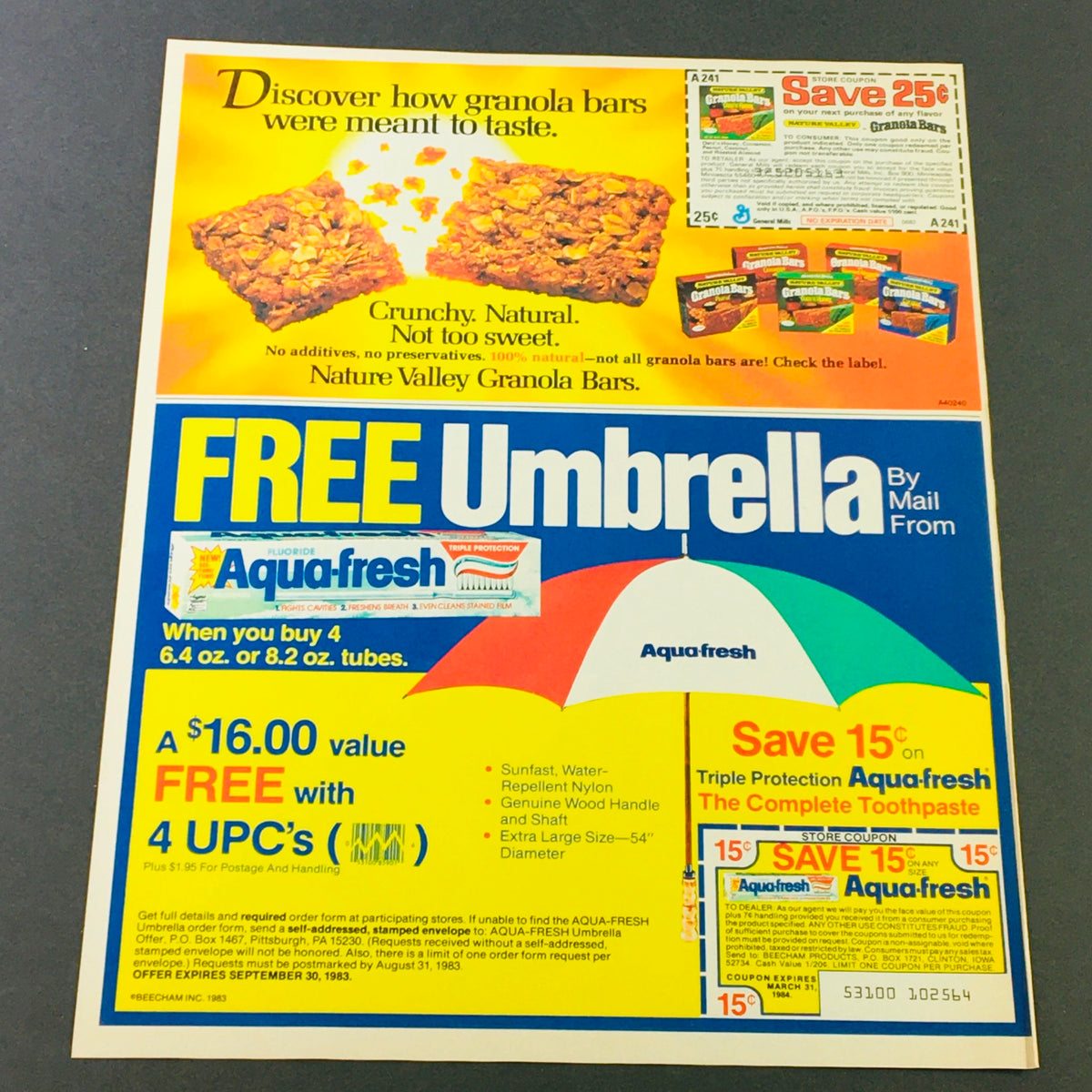 VTG Retro 1984 Aqua-Fresh advertisement promoting a free umbrella offer, showcasing Nature Valley granola bars, with a coupon for Aqua-Fresh toothpaste and eye-catching graphics.