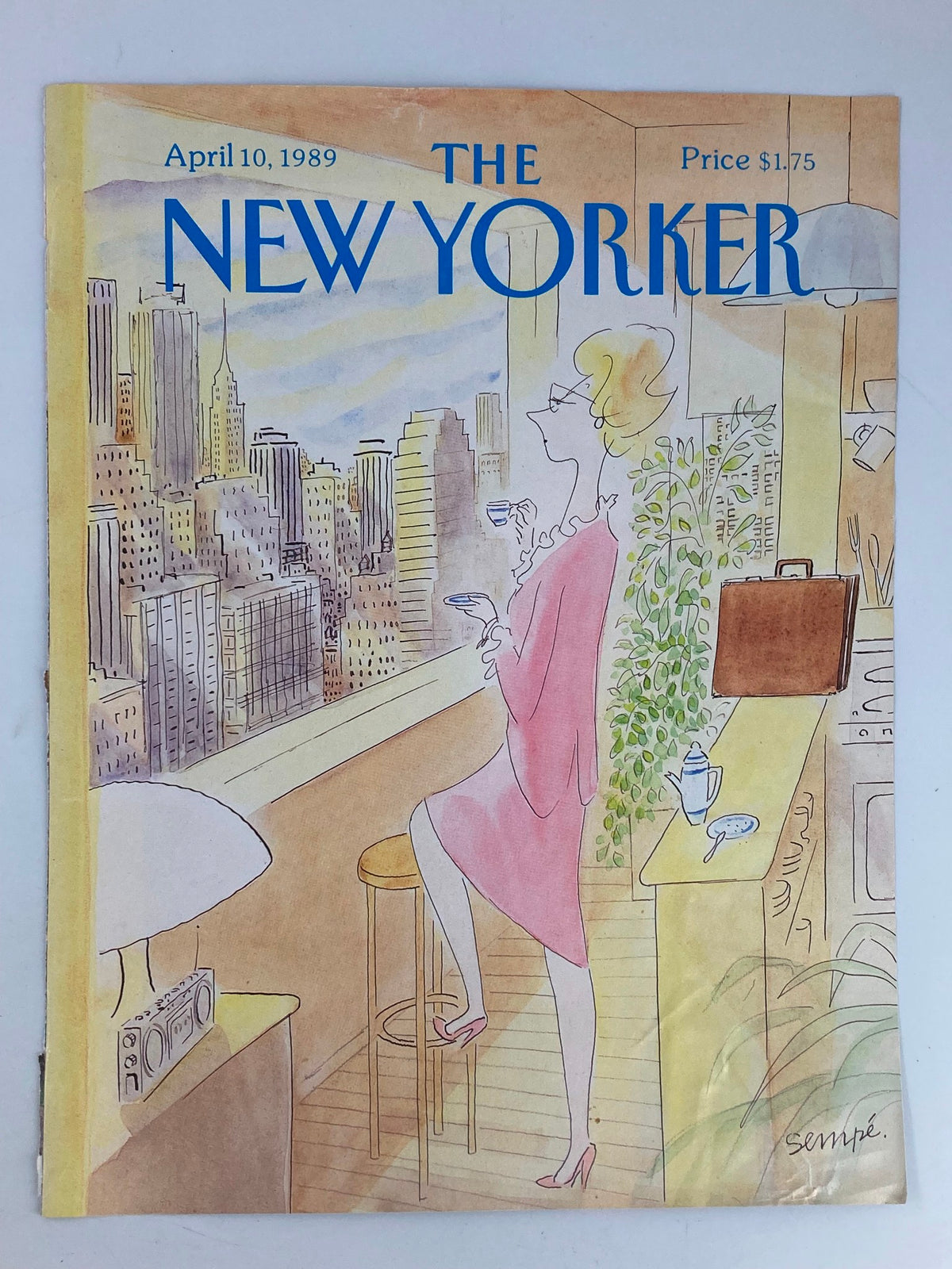 Another view of the April 10, 1989 cover of The New Yorker, illustrated by J. J. Sempe, depicting a fashionable woman in a pink dress standing in an apartment with a cityscape backdrop.