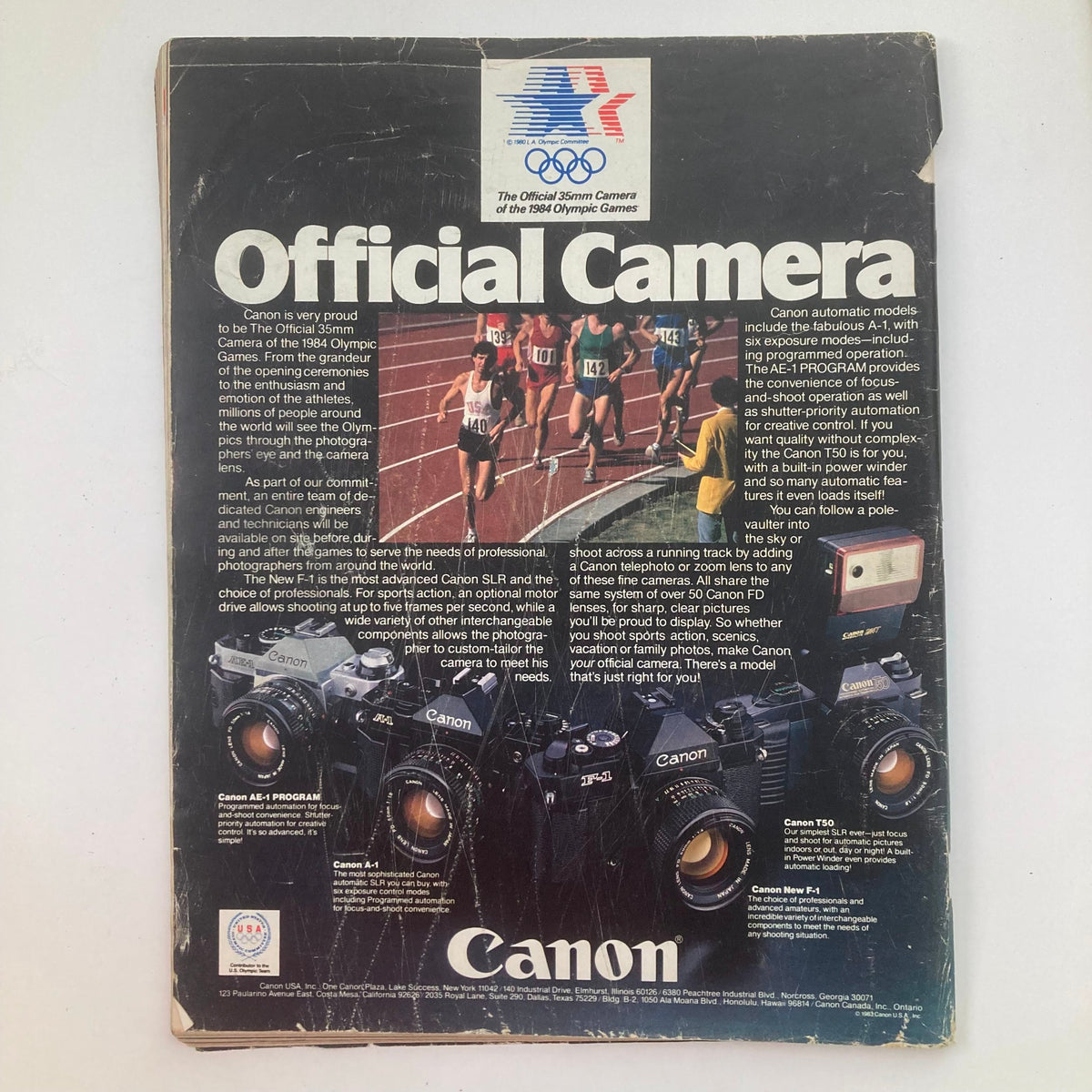 Back cover of 'VTG Life Magazine May 1984 Vol 7 No. 5 The History of Cocaine 1884-1984' advertising Canon cameras, highlighting their connection to the 1984 Olympic Games.