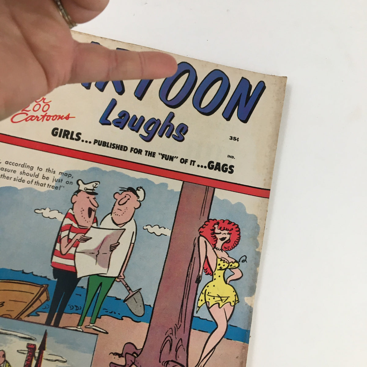 Close-up of the cover of VTG Cartoon Laughs No. 6 magazine showcasing humorous illustrations and characters from 1963.