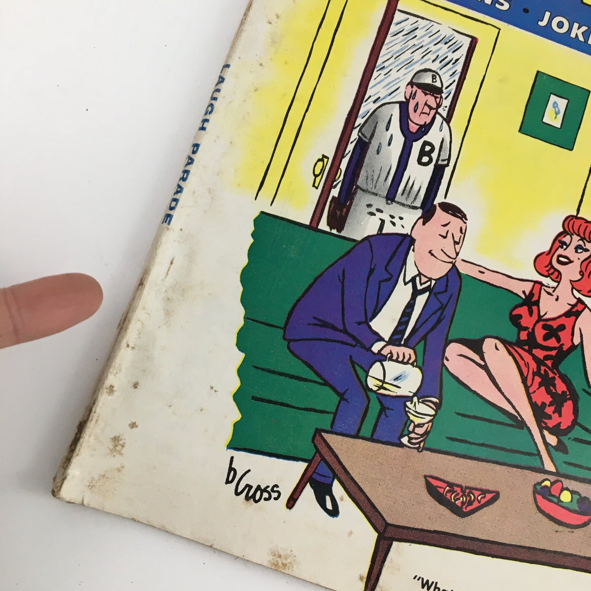 Close-up of the cover of Laugh Parade Humor Magazine July 1962, highlighting the artistic details and vibrant colors of the humorous scene.