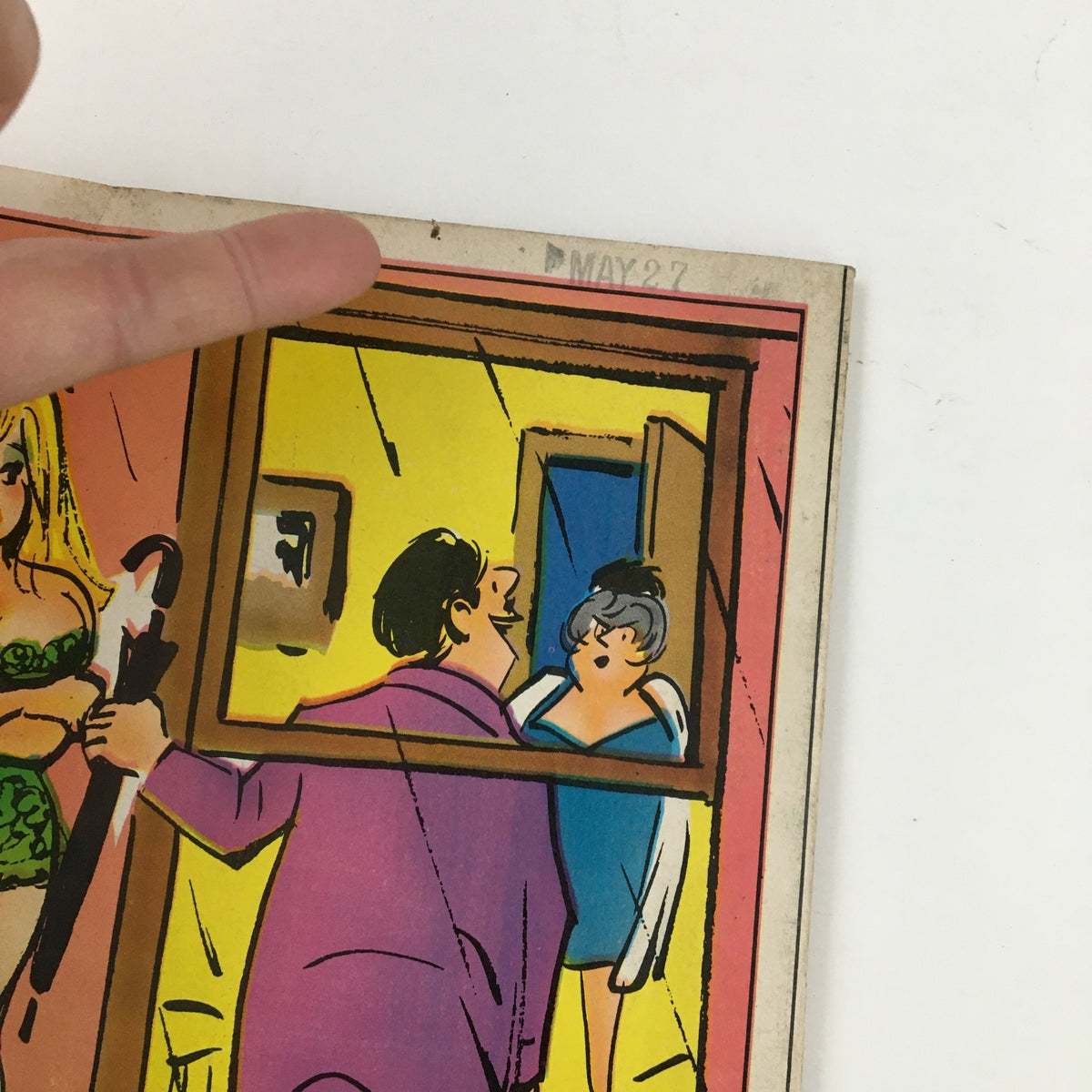 Illustration from the VTG 150 New Cartoons October 1971 No. 42 Charlton Joke Magazine, featuring a colorful comic scene with a character holding a frame and interacting with dressed figures inside a room, showcasing the humorous art style of the era.