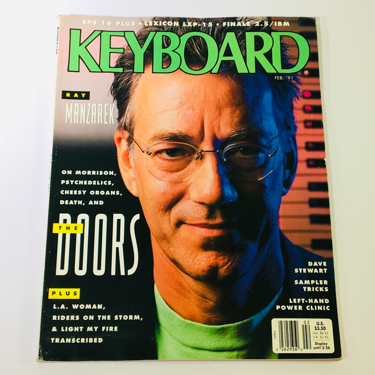 Keyboard Magazine February 1991 featuring Ray Manzarek on the cover, exploring Dave Stewart, Sampler Tricks, and a Power Clinic for music enthusiasts and collectors.