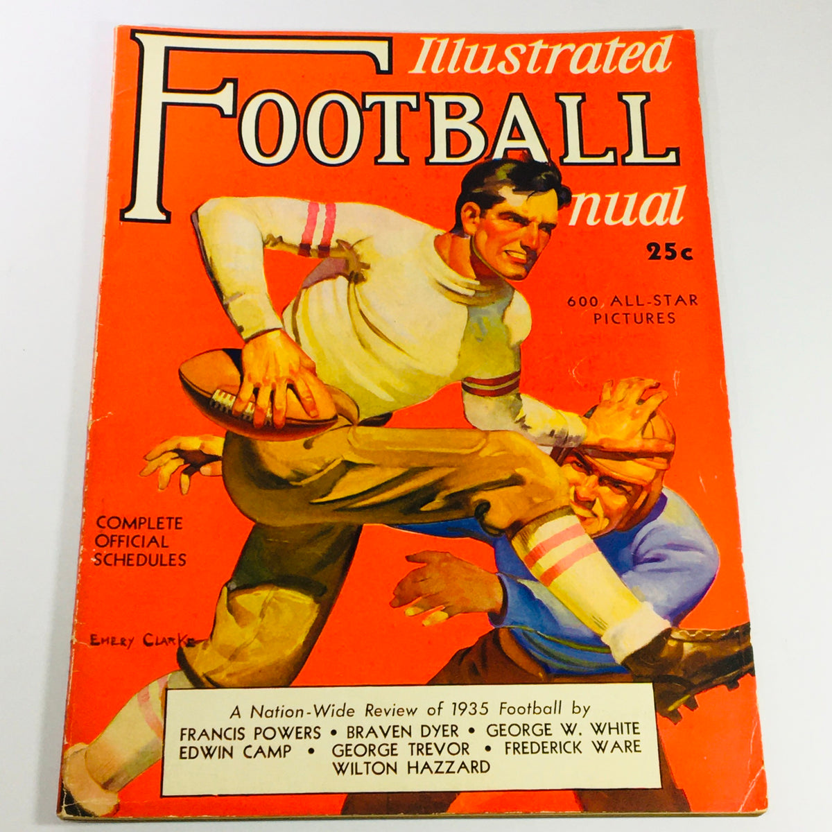 Cover of the VTG Illustrated Football Annual Magazine 1935 featuring vibrant artwork, showcasing a football player in action, authored by Francis Powers & Braven Dyer. The magazine includes 600 all-star pictures and complete official schedules.