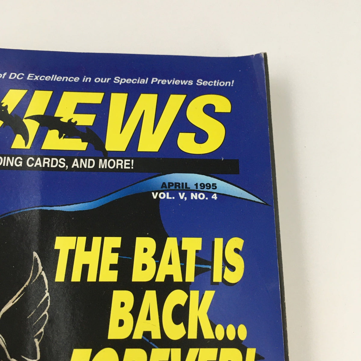Close-up of the top portion of Previews Magazine April 1995 Vol. V No. 4, highlighting the title and tagline 'THE BAT IS BACK... FOREVER!' along with the publication details for fans and collectors.