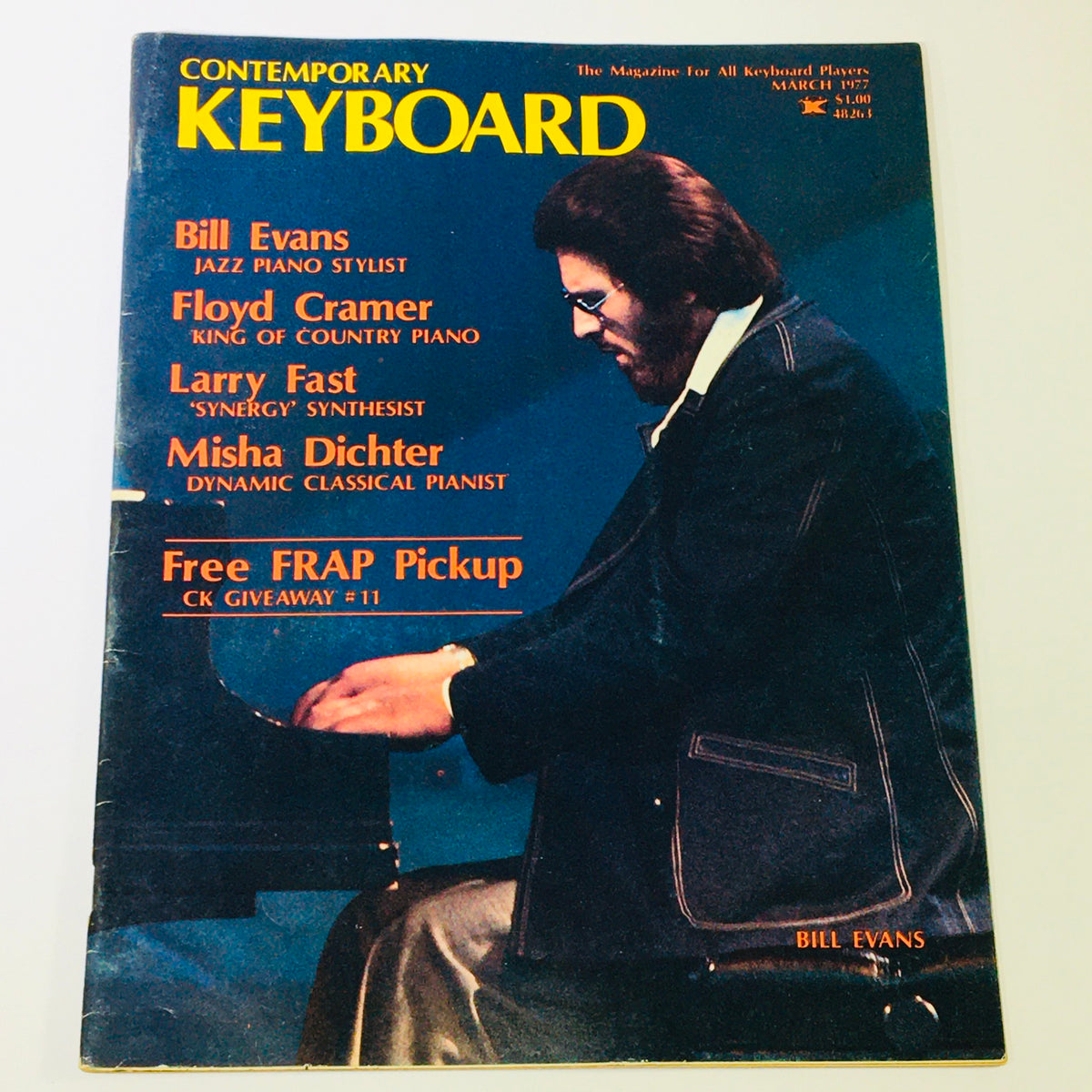 Vintage Keyboard Magazine March 1977 featuring Bill Evans, Floyd Cramer, Larry Fast, and Misha Dichter on the cover, highlighting jazz and classical piano styles.