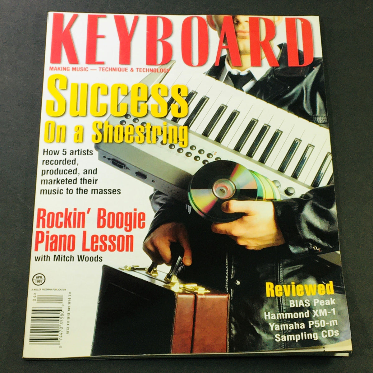 Cover of Keyboard Magazine April 1997 featuring Rockin' Boogie Piano Lesson with Mitch Woods, highlighting music technology and success on a shoestring.