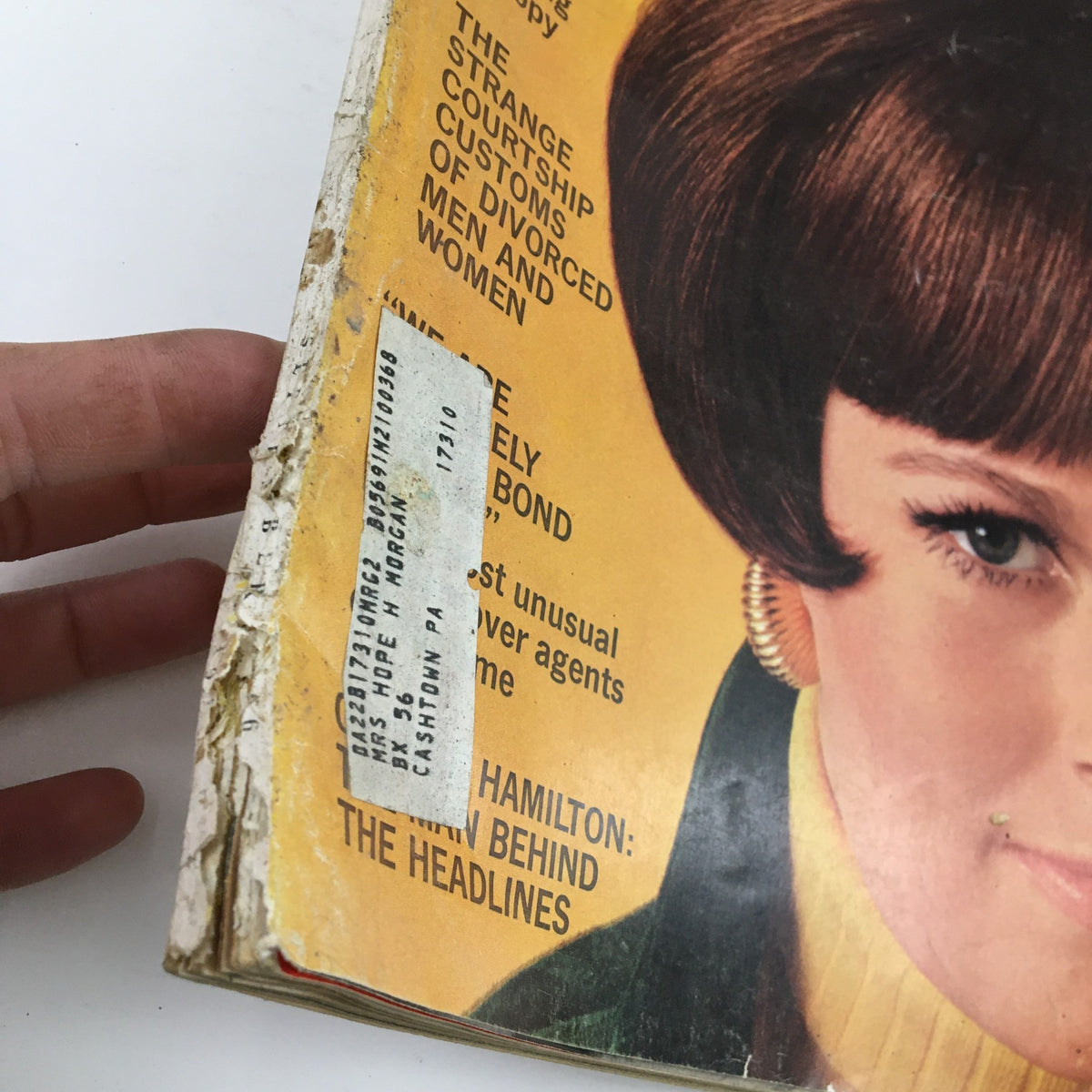 Detailed view of the spine of McCall's Magazine September 1966, featuring vintage wear including a label, highlighting its collectible status. The issue includes an interview with Mamie Eisenhower about 50 years of marriage.