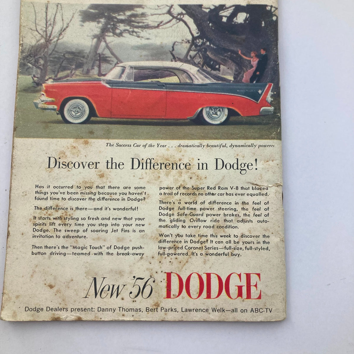 Cover of TV Guide Magazine May 5 1956 featuring a vibrant advertisement for the New 56 Dodge car, showcasing a striking design and promoting the features of the Dodge vehicle, encapsulating 1950s automotive culture.