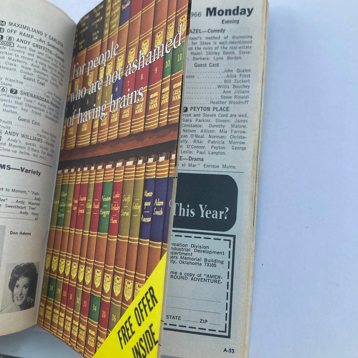 Another interior page of TV Guide Magazine April 9 1966 showcasing advertisements and TV listings, featuring a quote about intelligence.