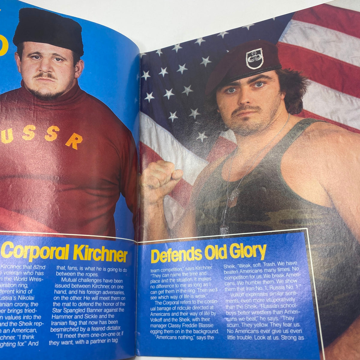1986 WWF Program featuring Nikolai Volkoff and Corporal Kirchner, showcasing two iconic wrestlers against the backdrop of the American and Soviet flags.