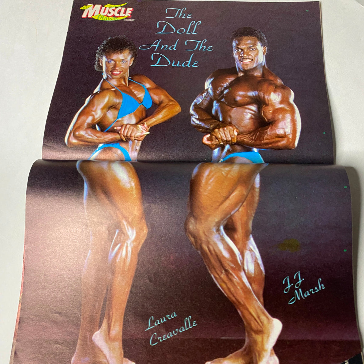 Muscle Training Illustrated August 1987 No. 136 features a centerfold photo of bodybuilders Laura Creavalle and J.J. Marsh in posing attire, showcasing their muscular physiques.