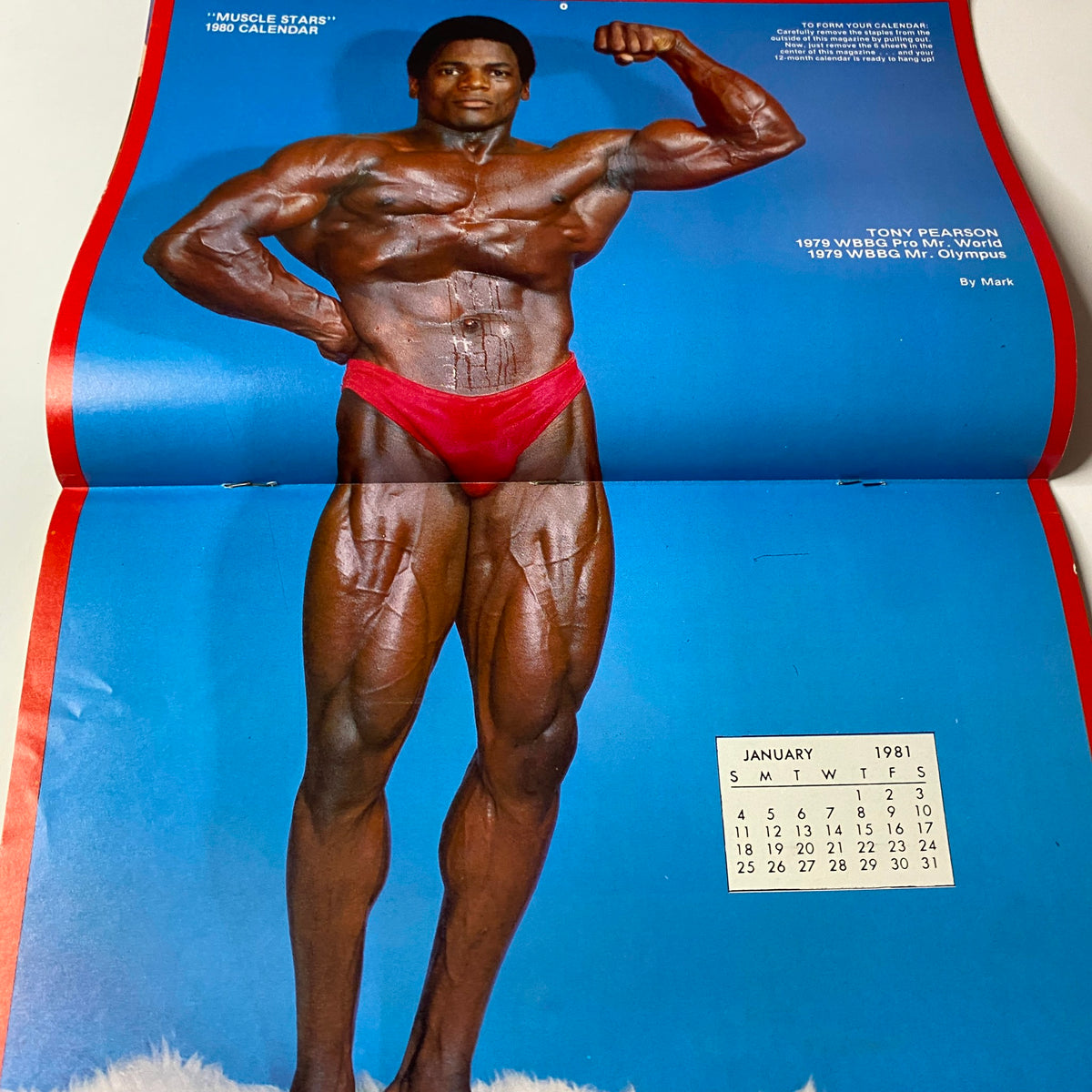 Centerfold image from Muscle Training Illustrated Picture Book March 1980 showcasing bodybuilder Tony Pearson with a 1980 wall calendar.