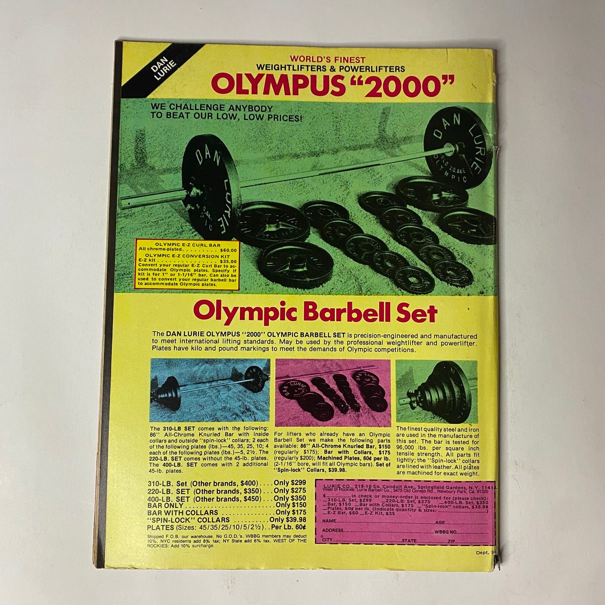 Olympus 2000 Olympic Barbell Set advertisement showcasing weights and powerlifting equipment, featured in Muscle Training Illustrated January 1982 No. 96 Chris Dickerson with Centerfold.