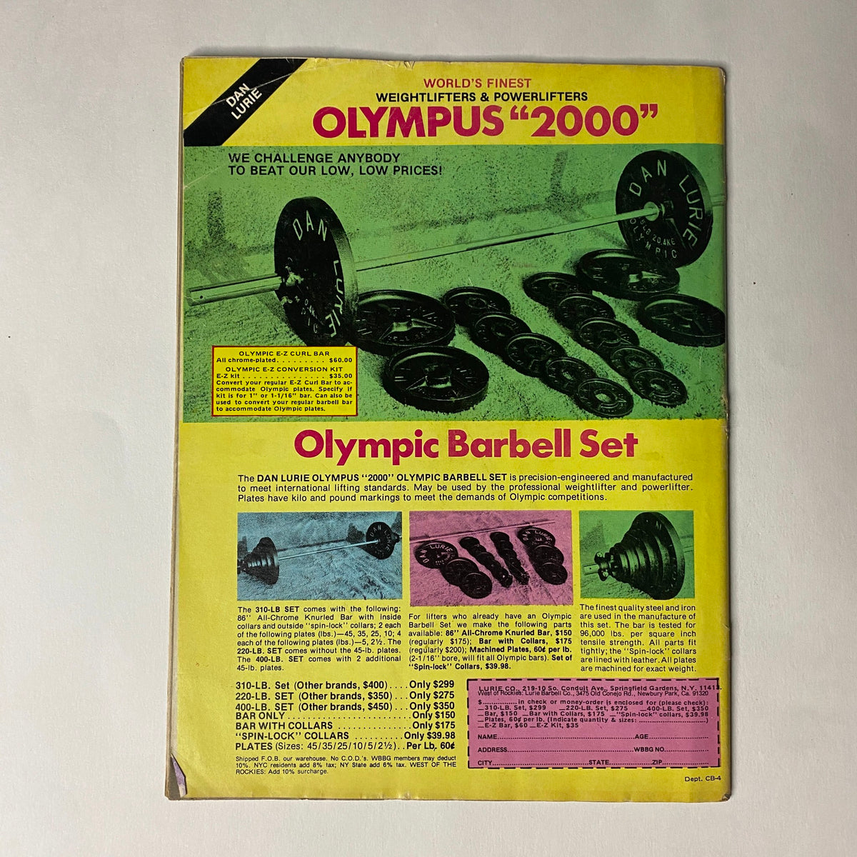Back cover of Muscle Training Illustrated 1982 advertising the Dan Lurie Olympus '2000' Olympic Barbell Set, featuring weightlifting equipment and prices.