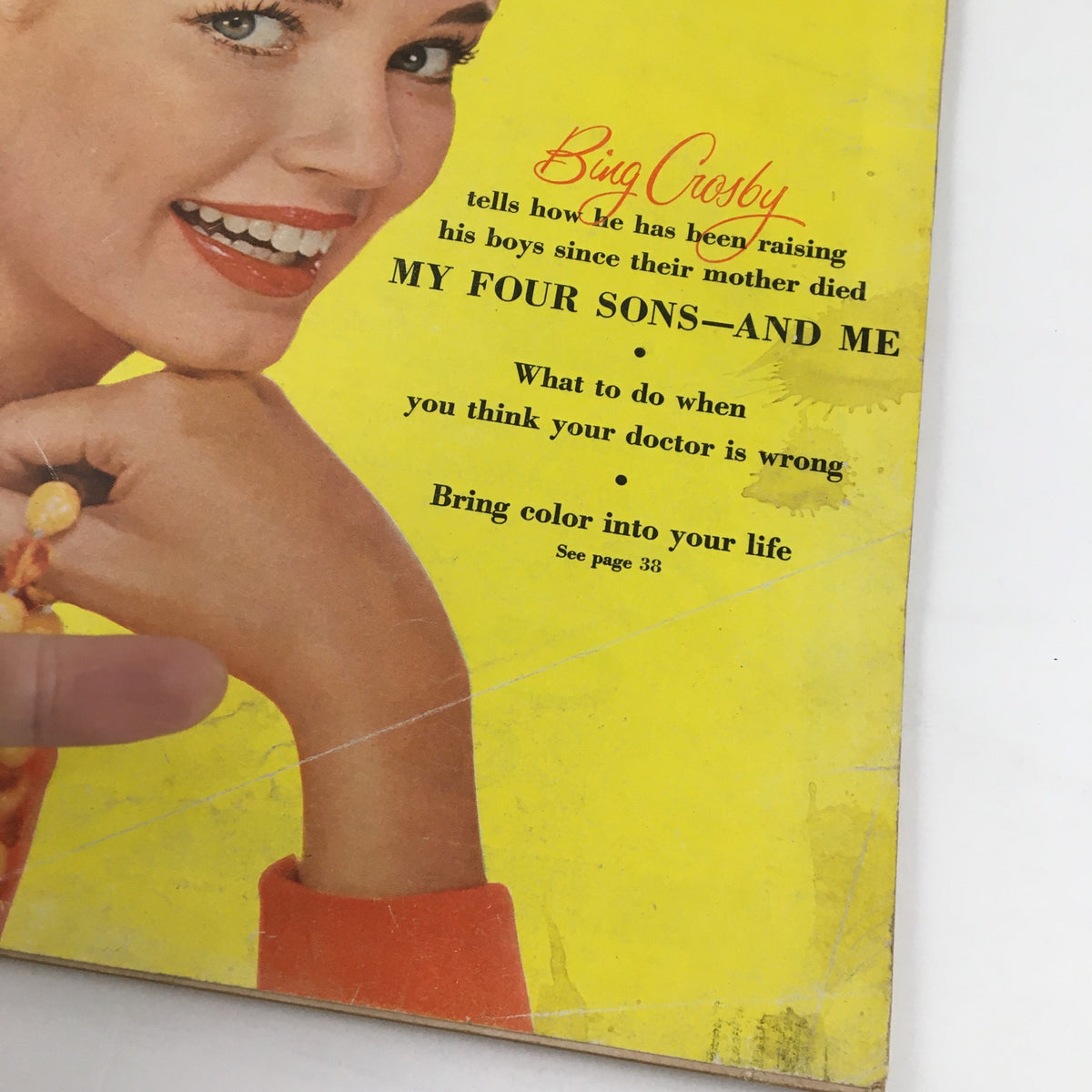 Back cover view of McCall's Magazine, October 1954, featuring Bing Crosby's article headline about raising his sons after their mother died.