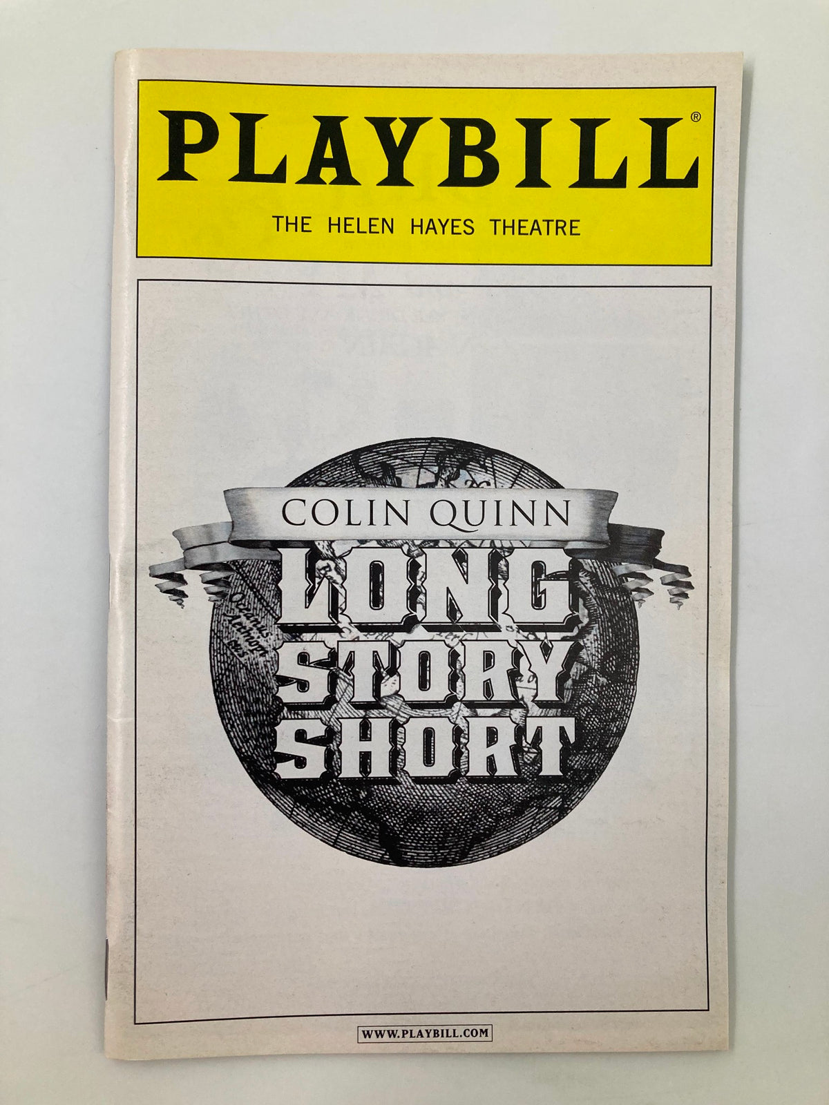 2010 Playbill for Colin Quinn's show 'Long Story Short' at the Helen Hayes Theatre, featuring a vintage design with bold text.