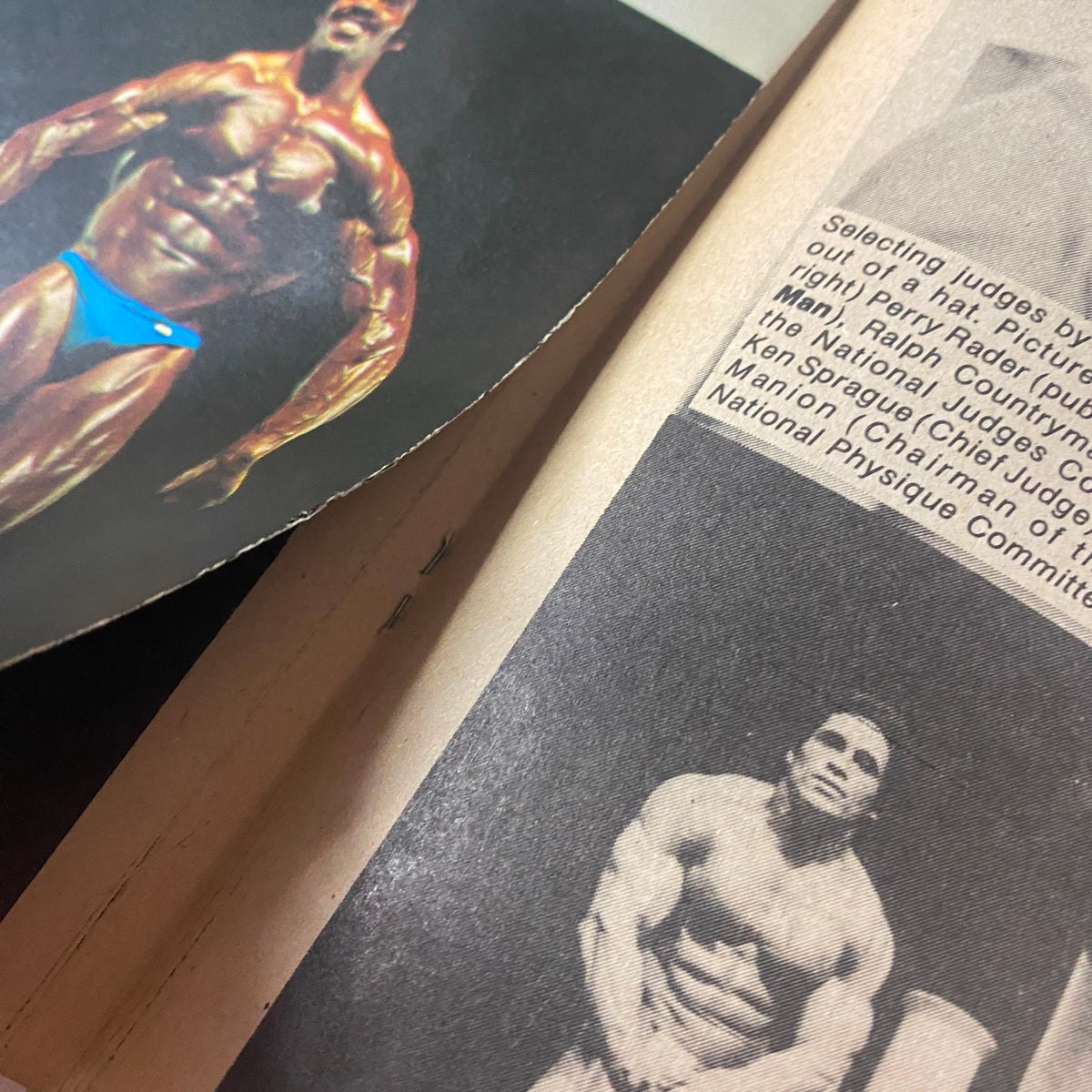 Close-up of a bodybuilding photograph in Muscle Up Magazine February 1980, highlighting a competitor in the Mr. USA event with a detailed analysis of judging criteria.