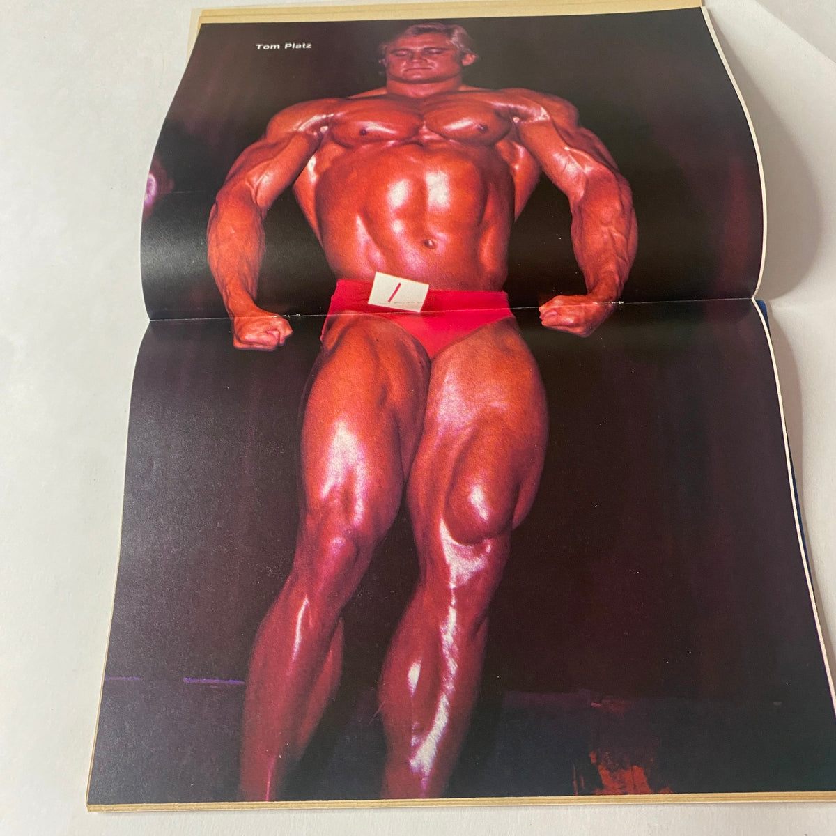 Centerfold image from Muscle Up Magazine June 1980 featuring Tom Platz showcasing his bodybuilding physique.