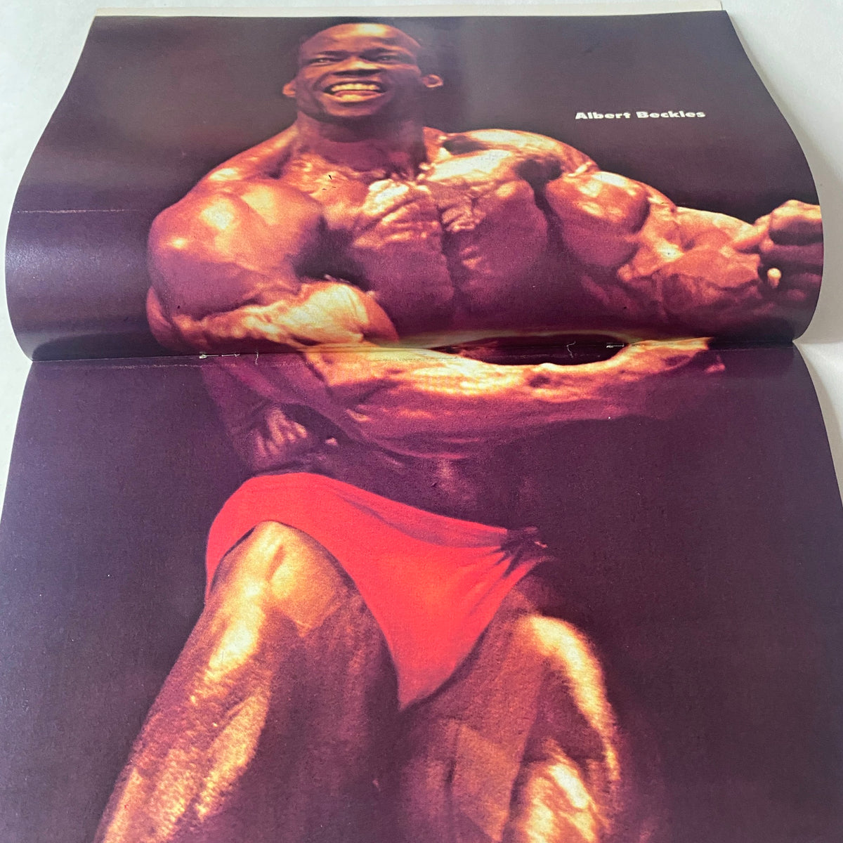 Centerfold image from Muscle Up Magazine December 1981 showcasing bodybuilder Albert Beckles in an impressive pose.