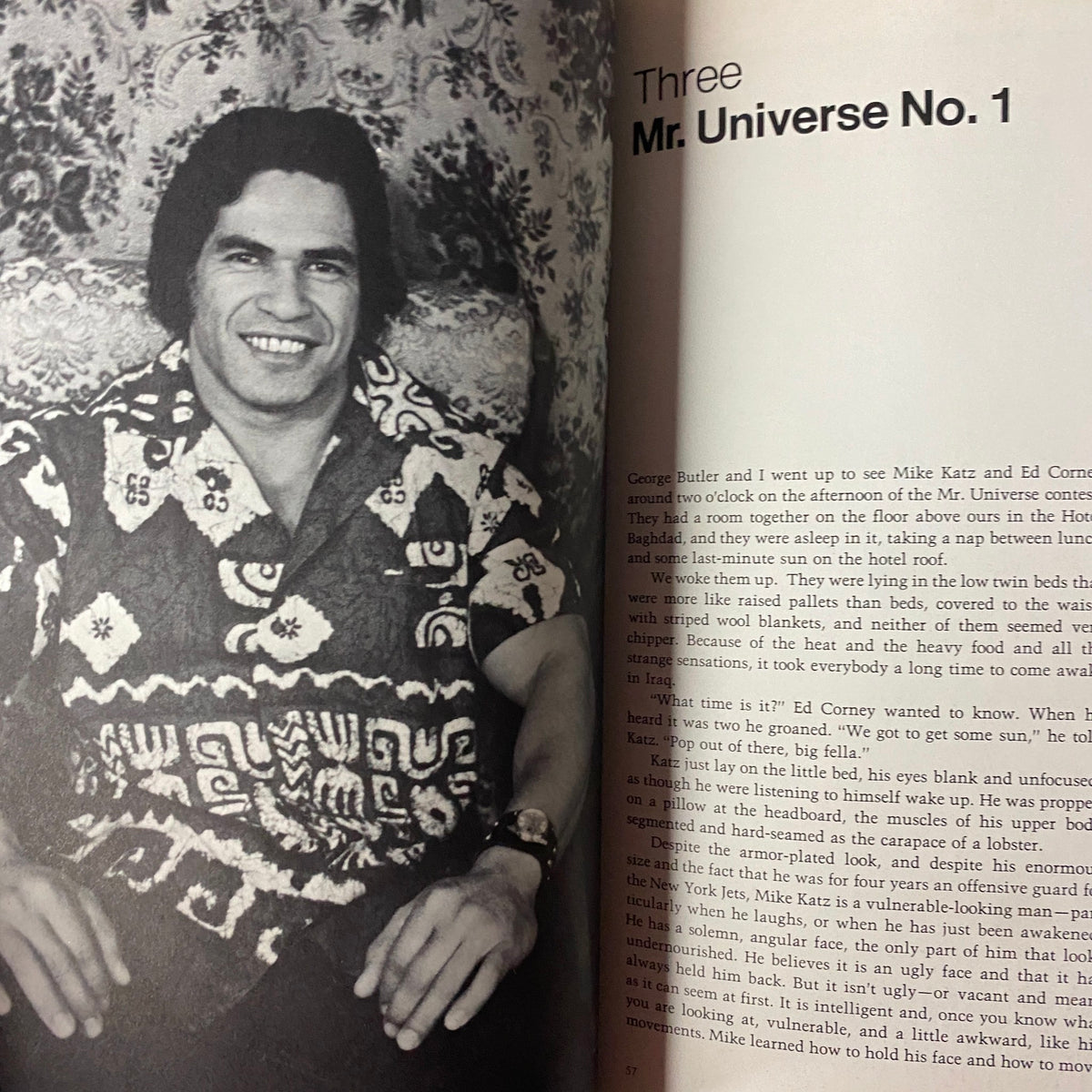 Interior page from 'Pumping Iron: The Art & Sport of Bodybuilding', featuring Ed Corney, Mr. Universe No. 1, in a colorful shirt, captured during a discussion about the bodybuilding competition.