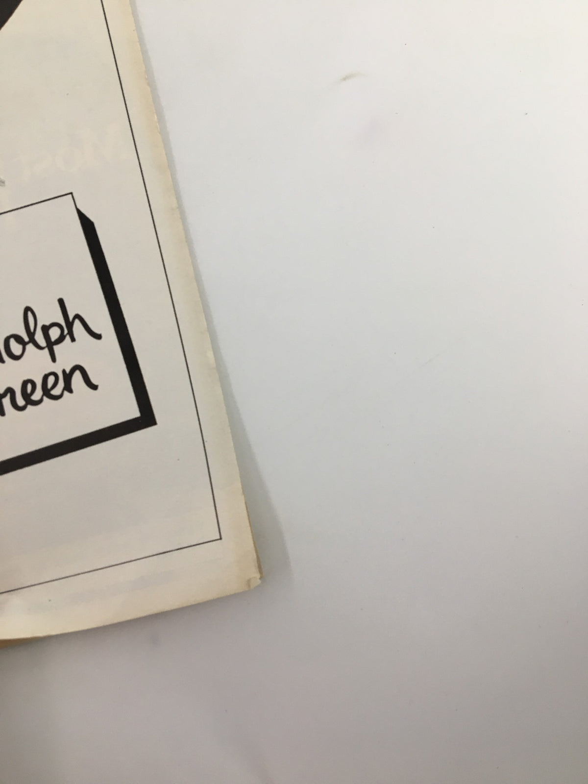 Side angle of the 1977 Playbill for 'A Party With Betty Comden & Adolph Green,' highlighting the program's aged pages and signature.