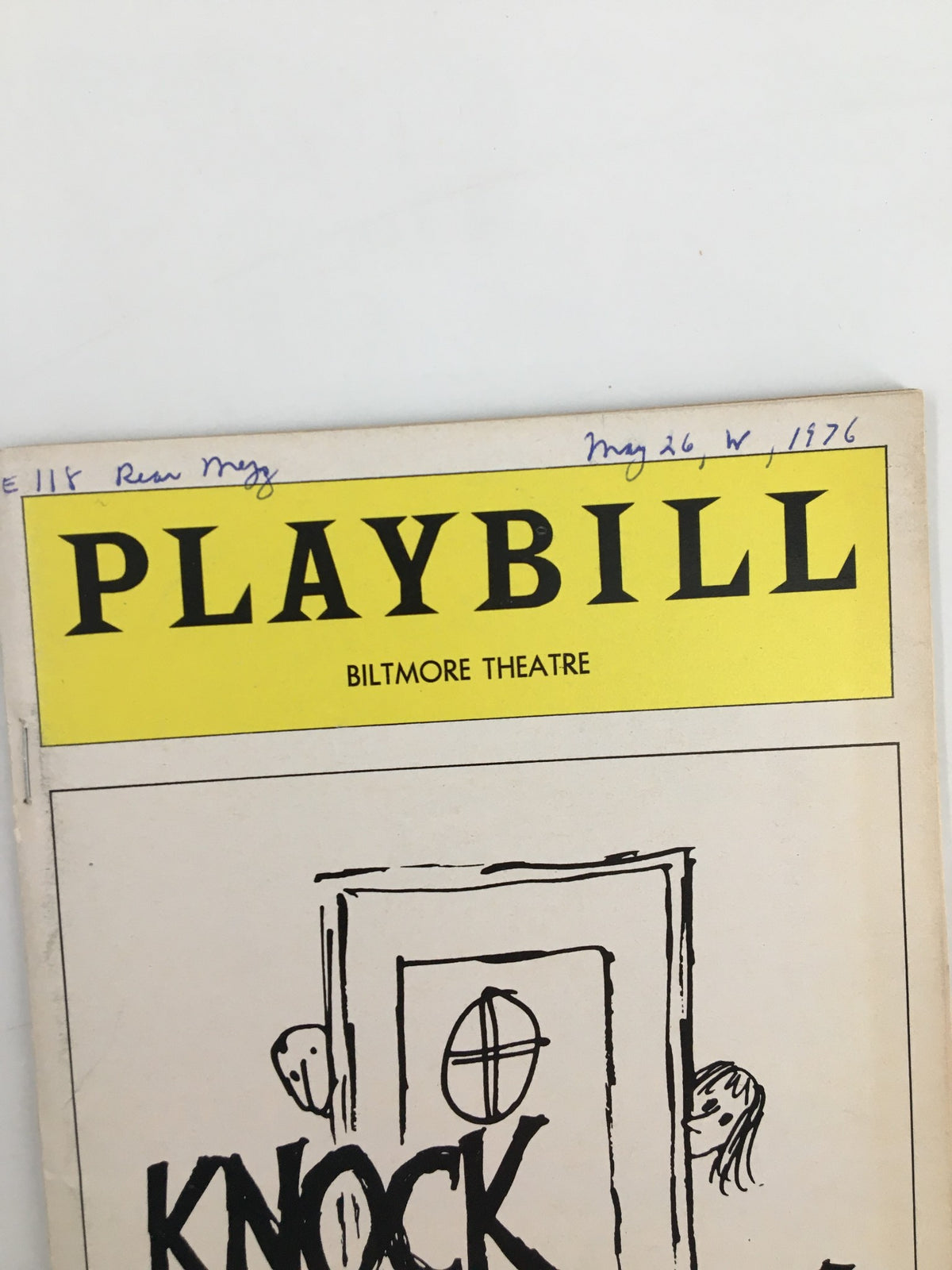Close-up view of the 1976 Playbill for Knock Knock showcasing the Biltmore Theatre logo and handwritten date.